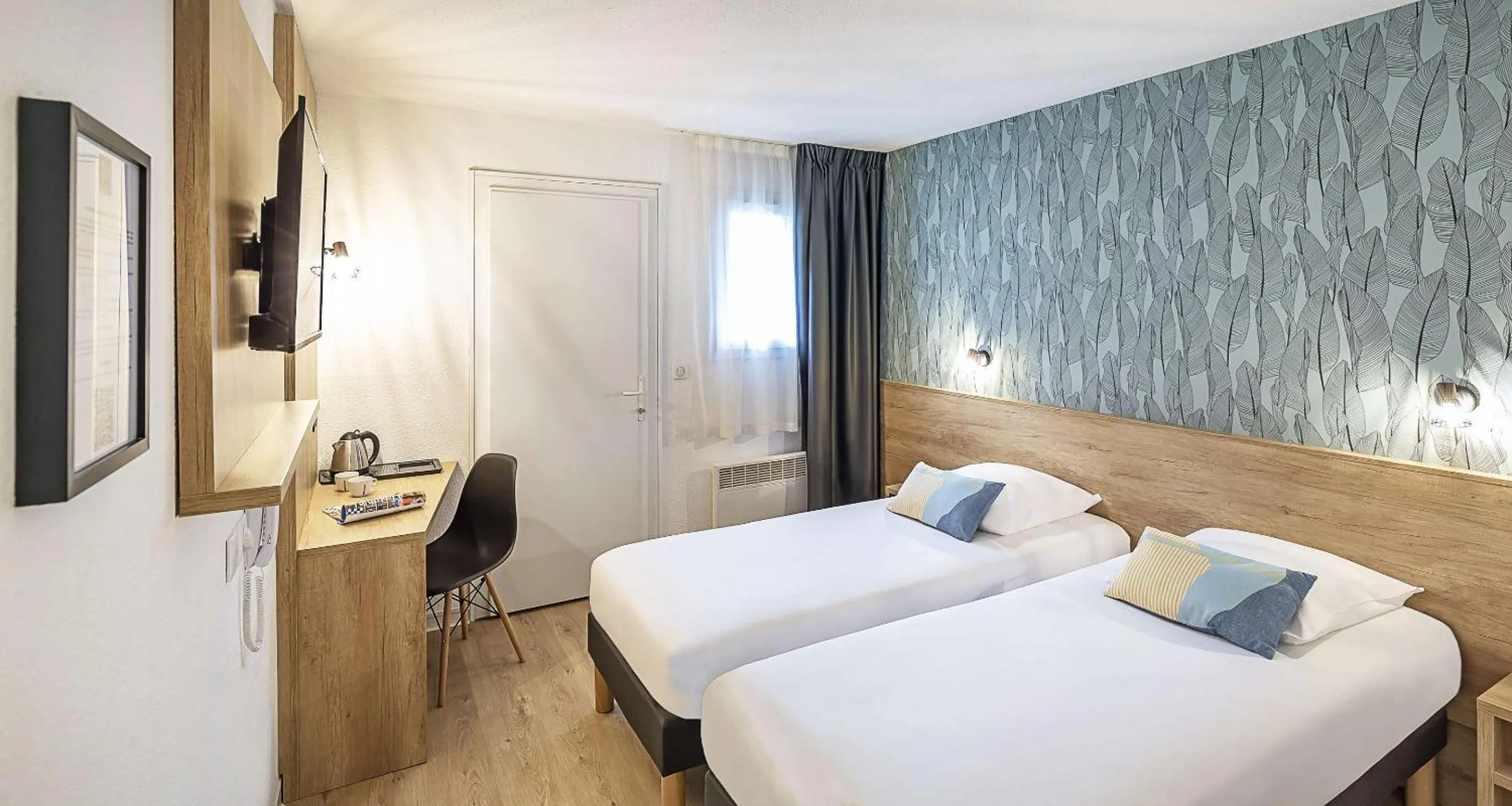 Bedroom, Bed in Ostal Pau Universite - Sure Hotel Collection by Best Western