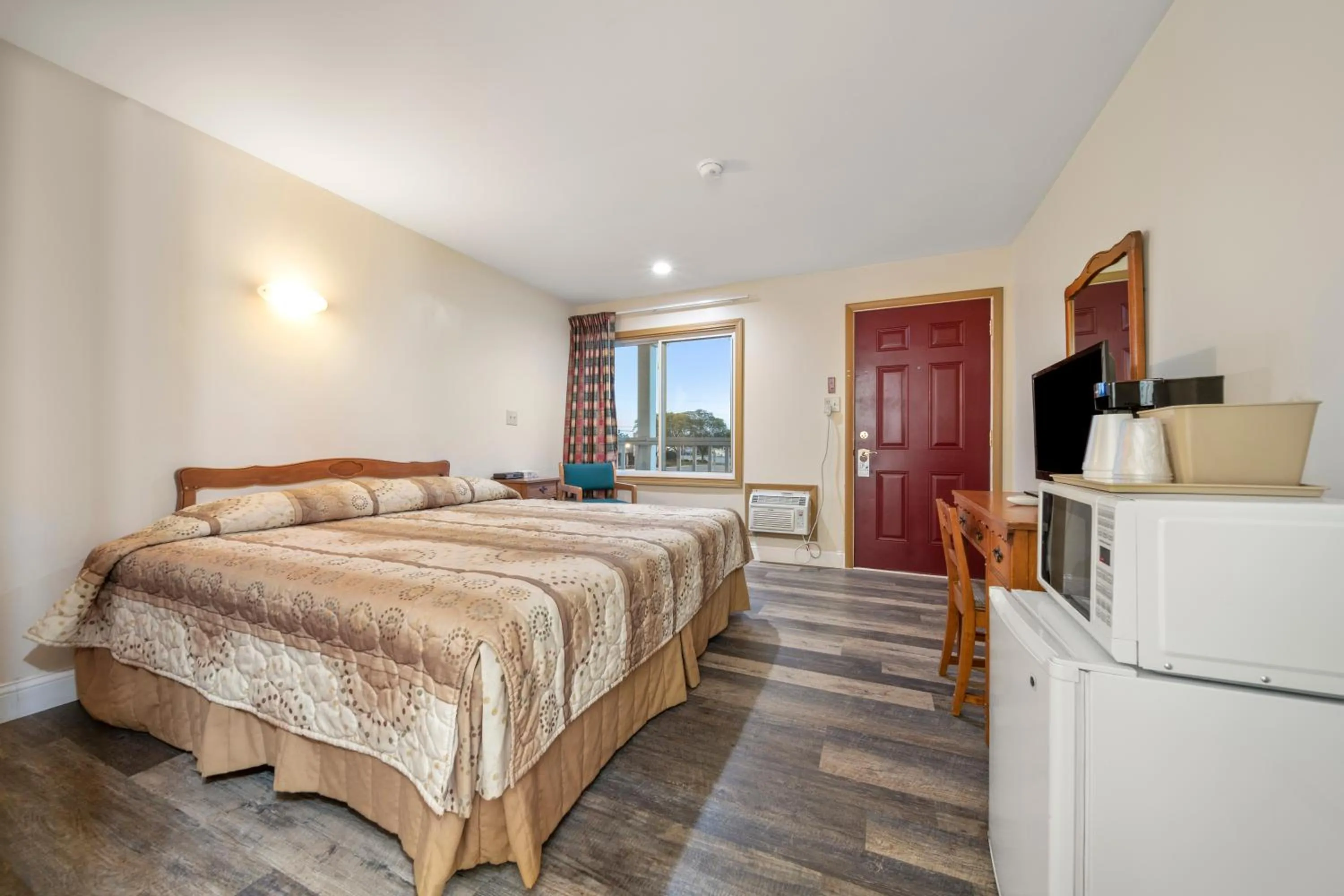 Bed in Thumb Heritage Inn