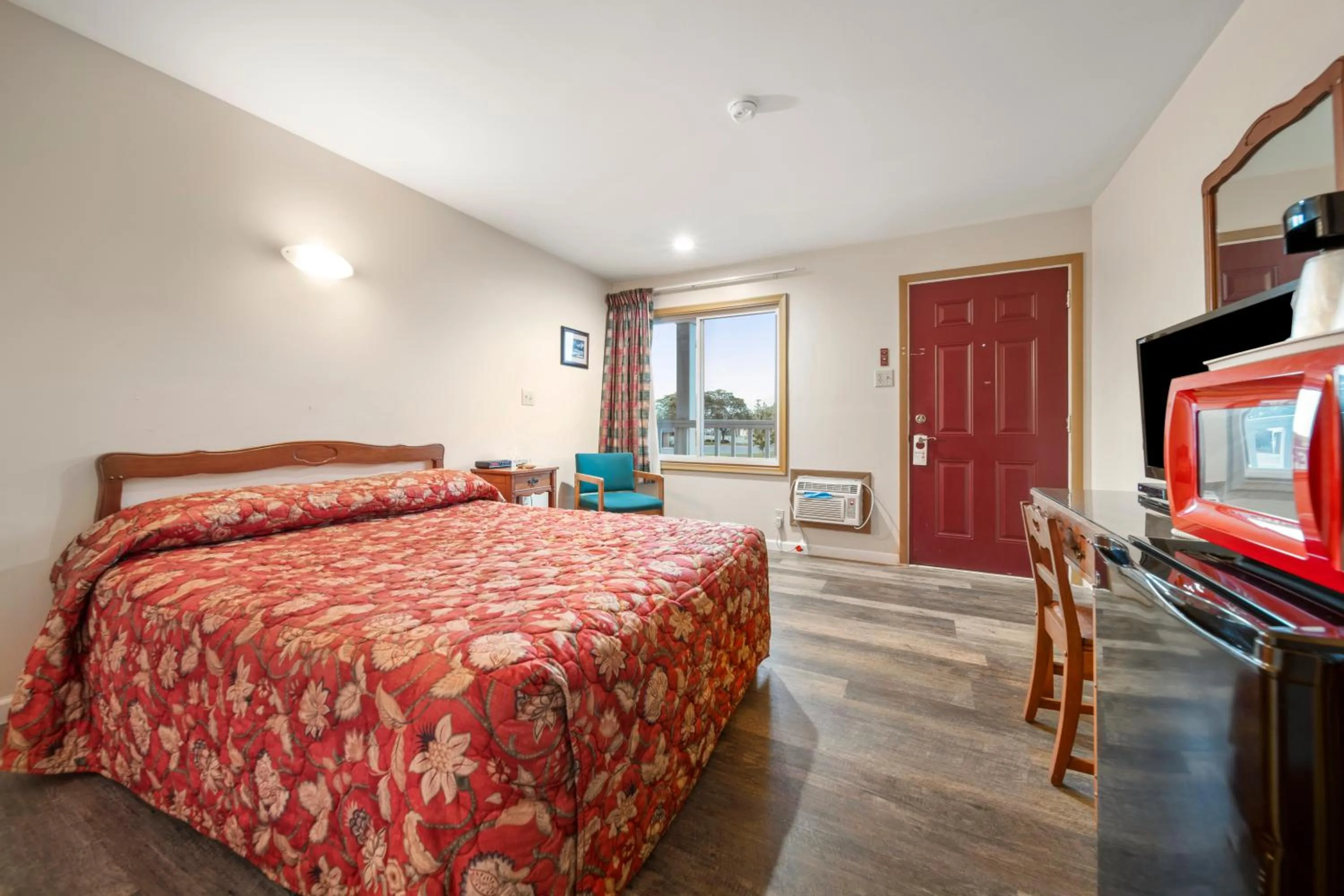 Bed in Thumb Heritage Inn