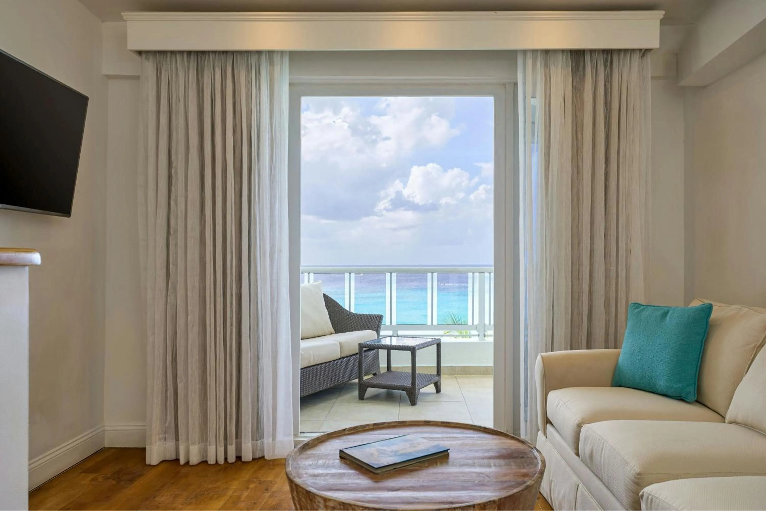 Living room in Waves Resort & Spa, Barbados, An Autograph Collection All-Inclusive Resort