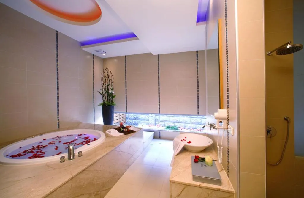 Bed in Le chateau Motel