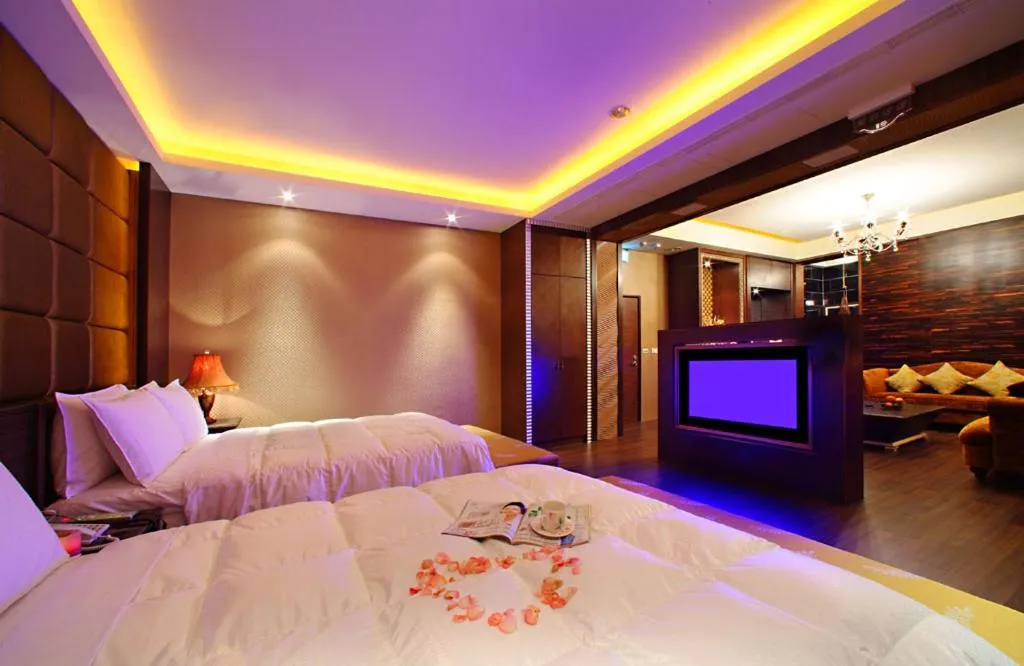 Bed in Le chateau Motel