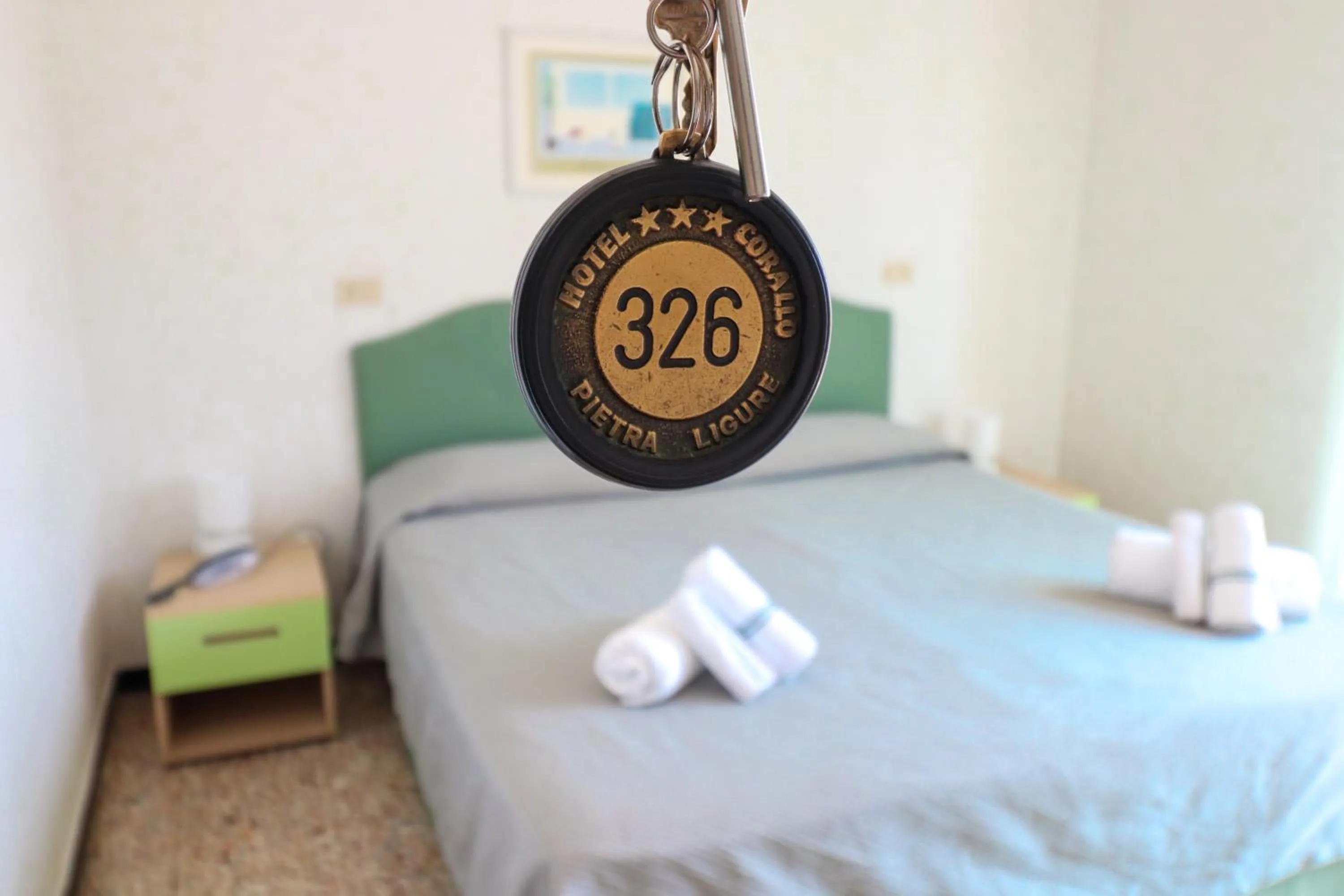 Bed in Hotel Corallo