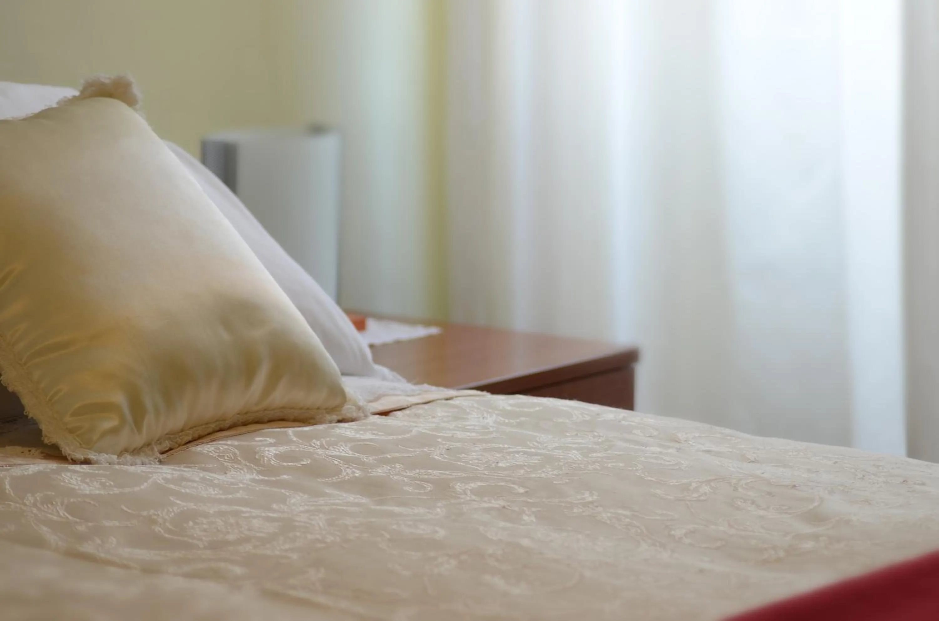 Bed in Hotel La Fenice