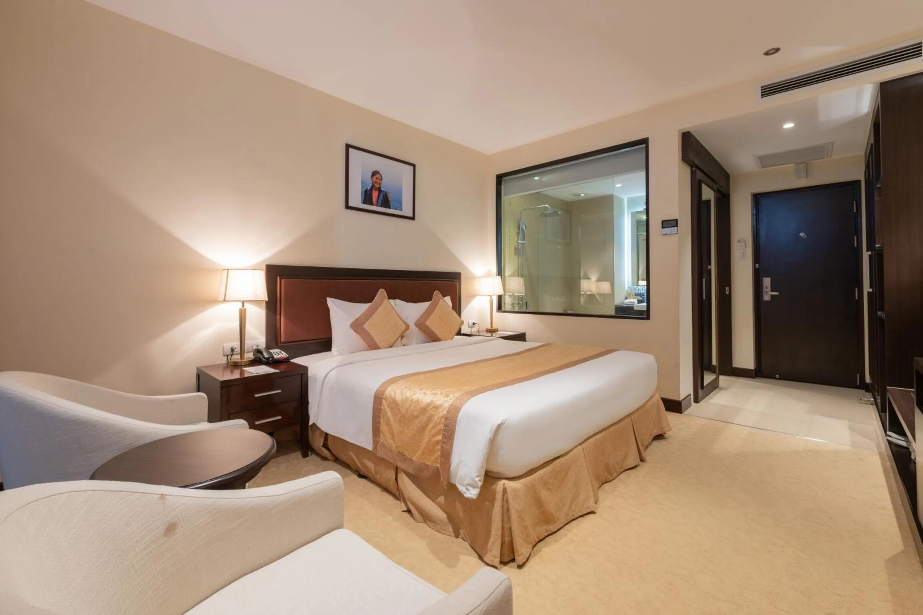 Bed in Red River View Hotel