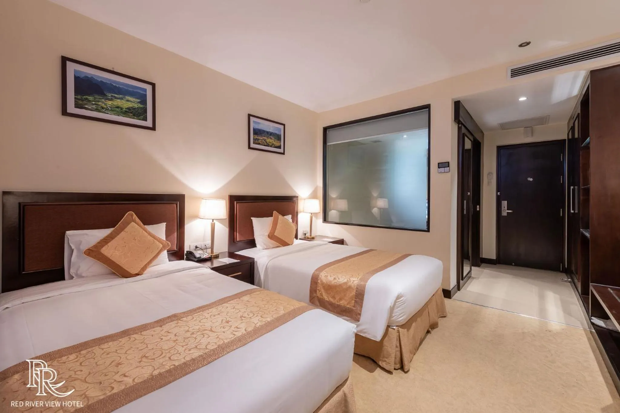 Bed in Red River View Hotel