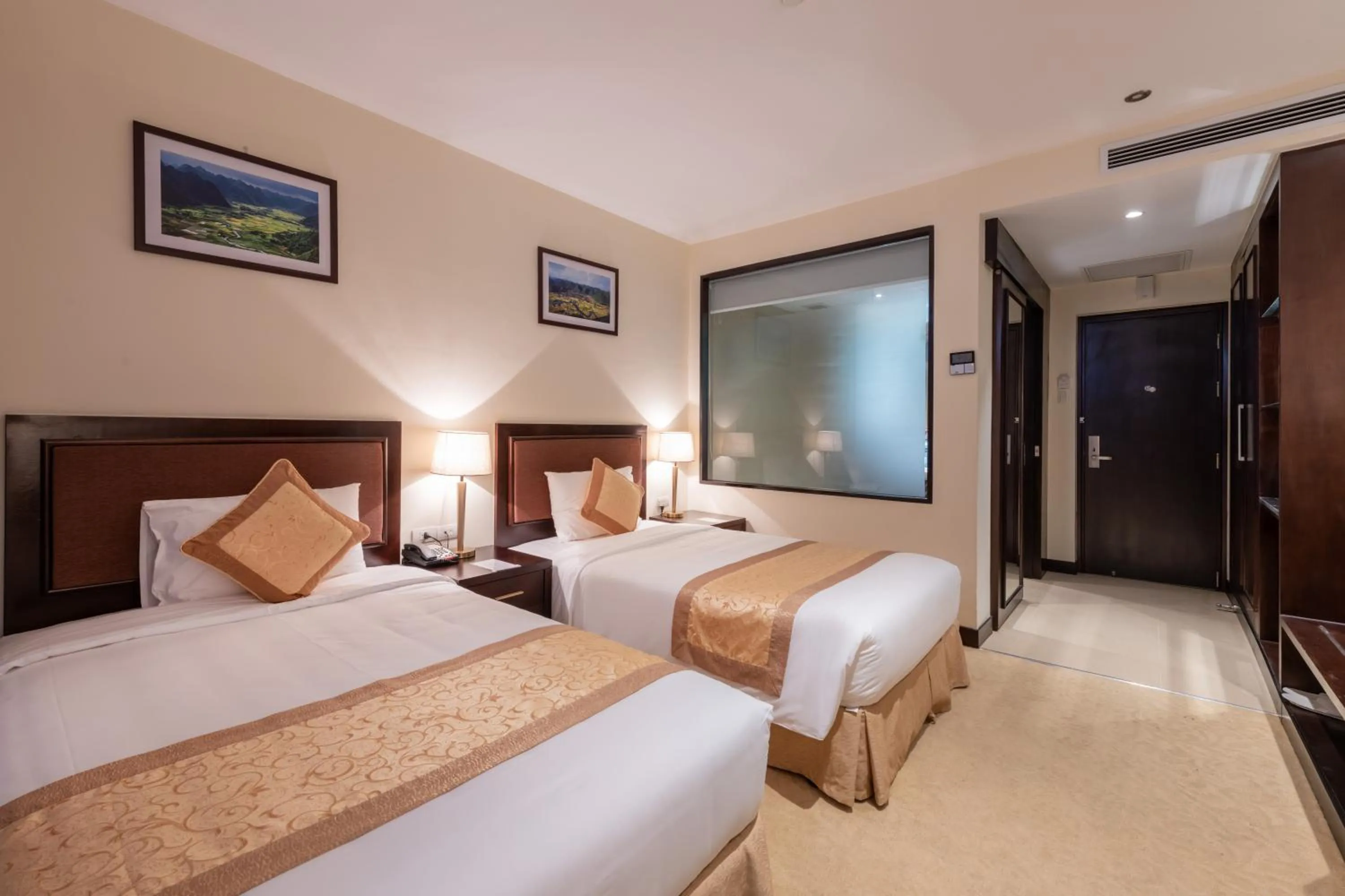 Bed in Red River View Hotel