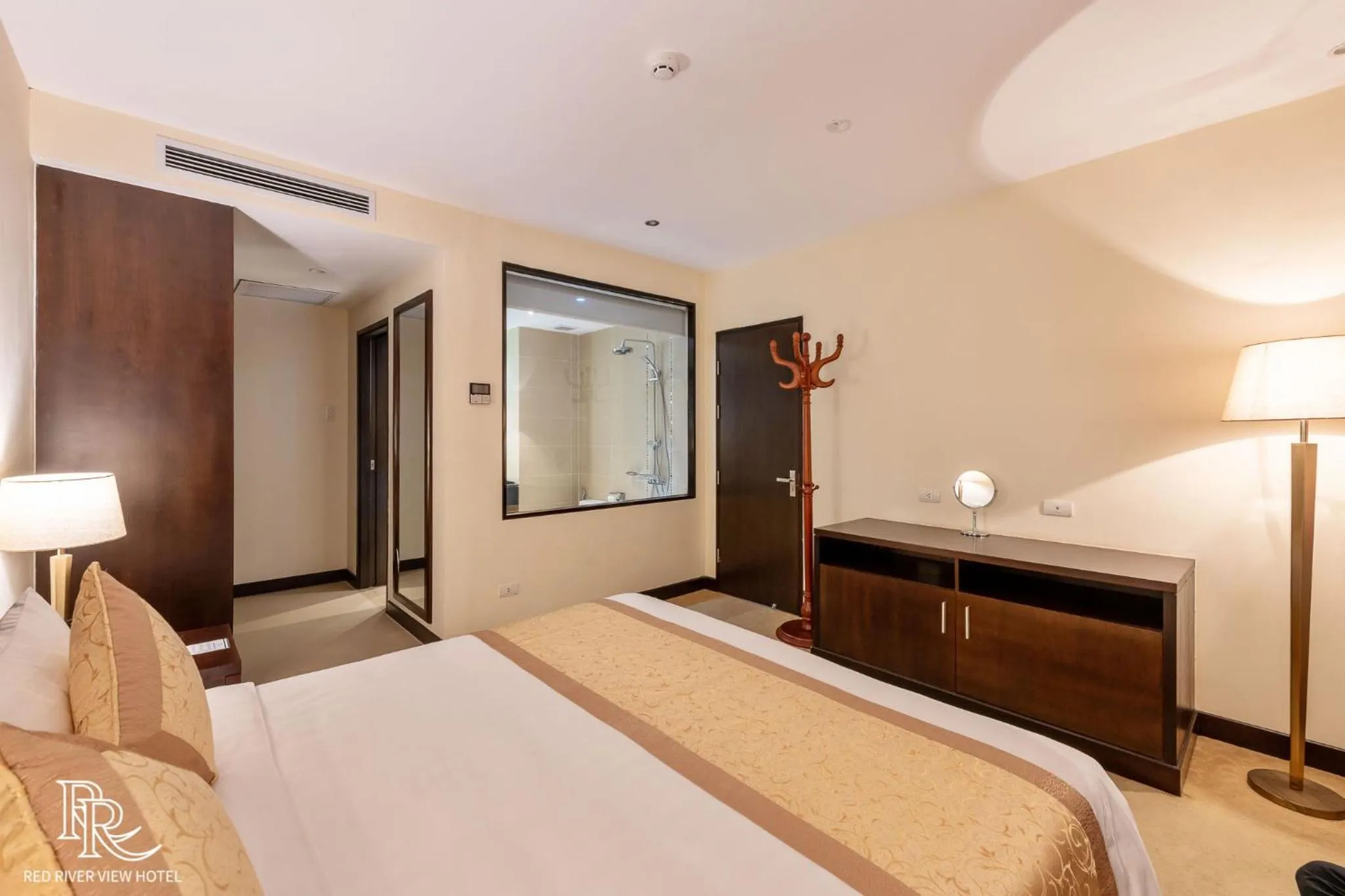 Bed in Red River View Hotel