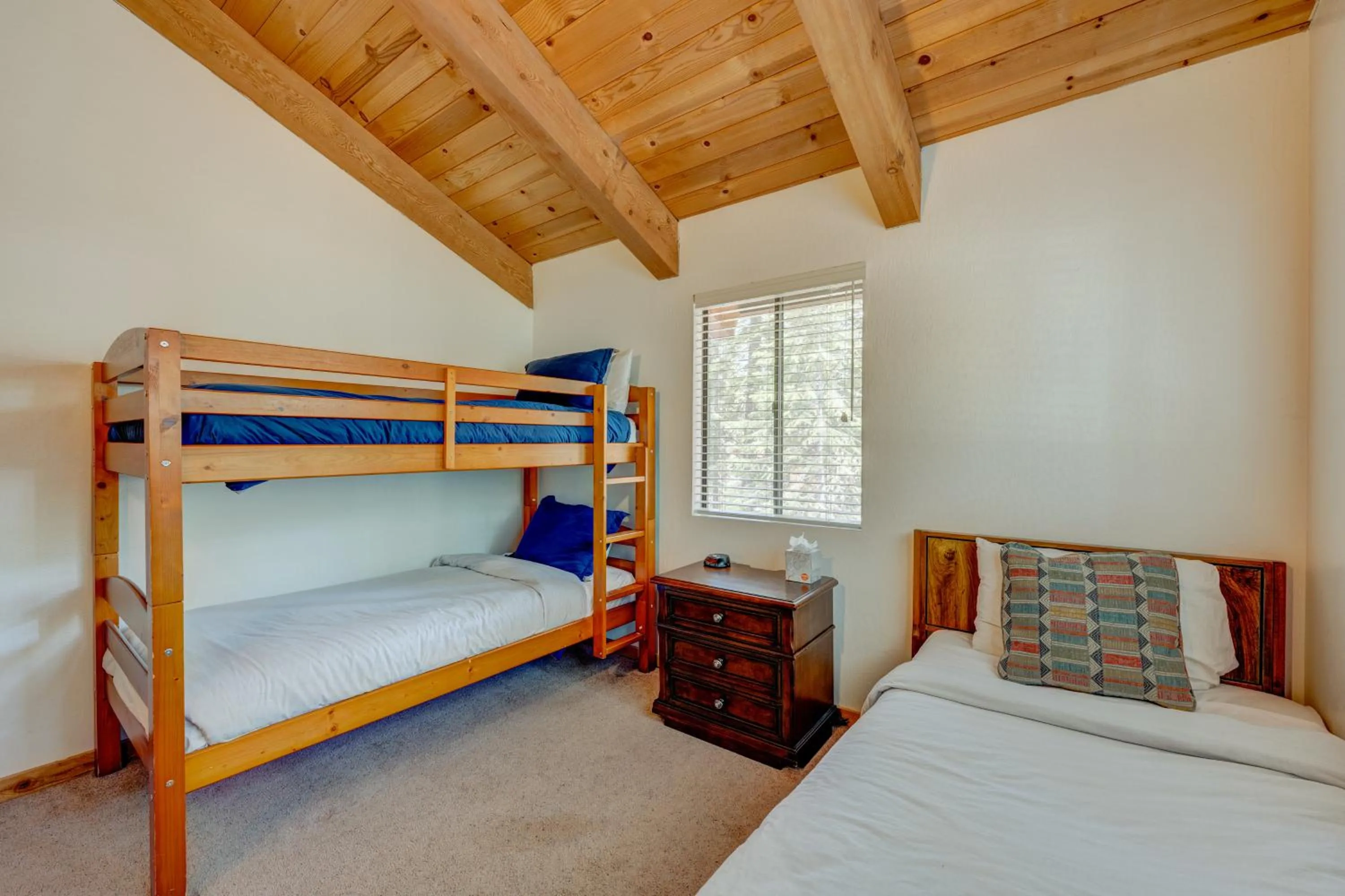 Bed in Beaver Pond Northstar Luxury Chalet with Hot Tub