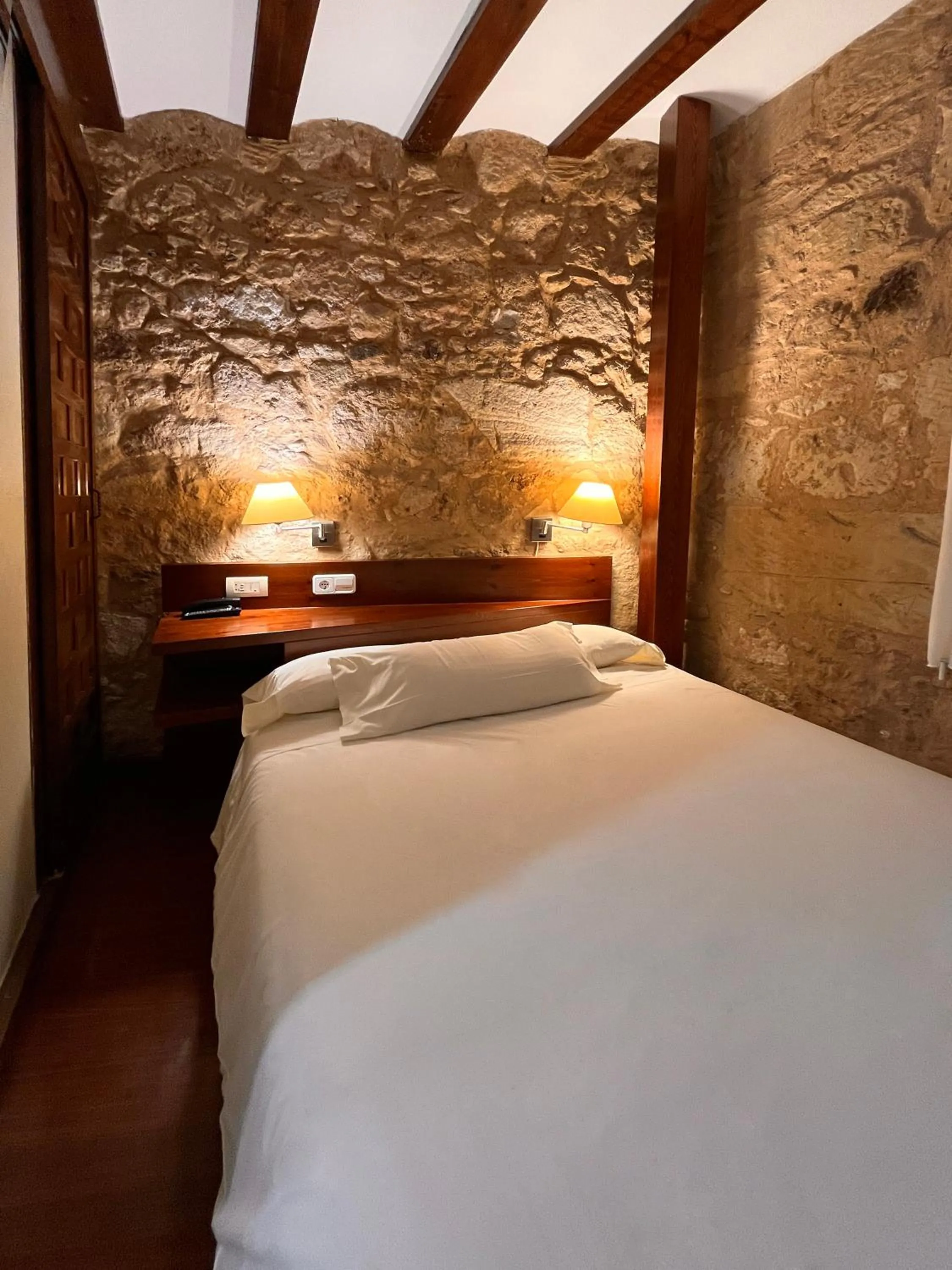 Bed in Hotel Microtel Placentinos