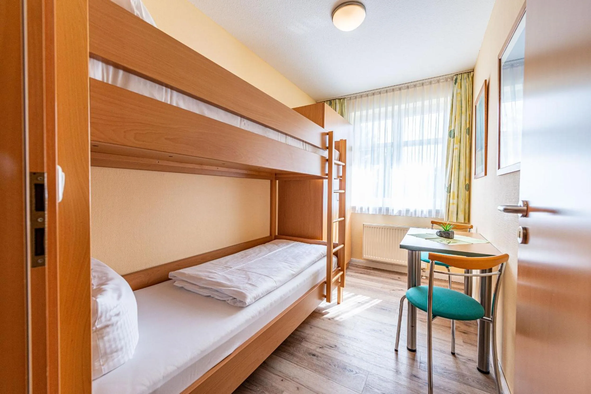 Photo of the whole room, Bed in Am Weststrand Apartmenthaus Waldeck