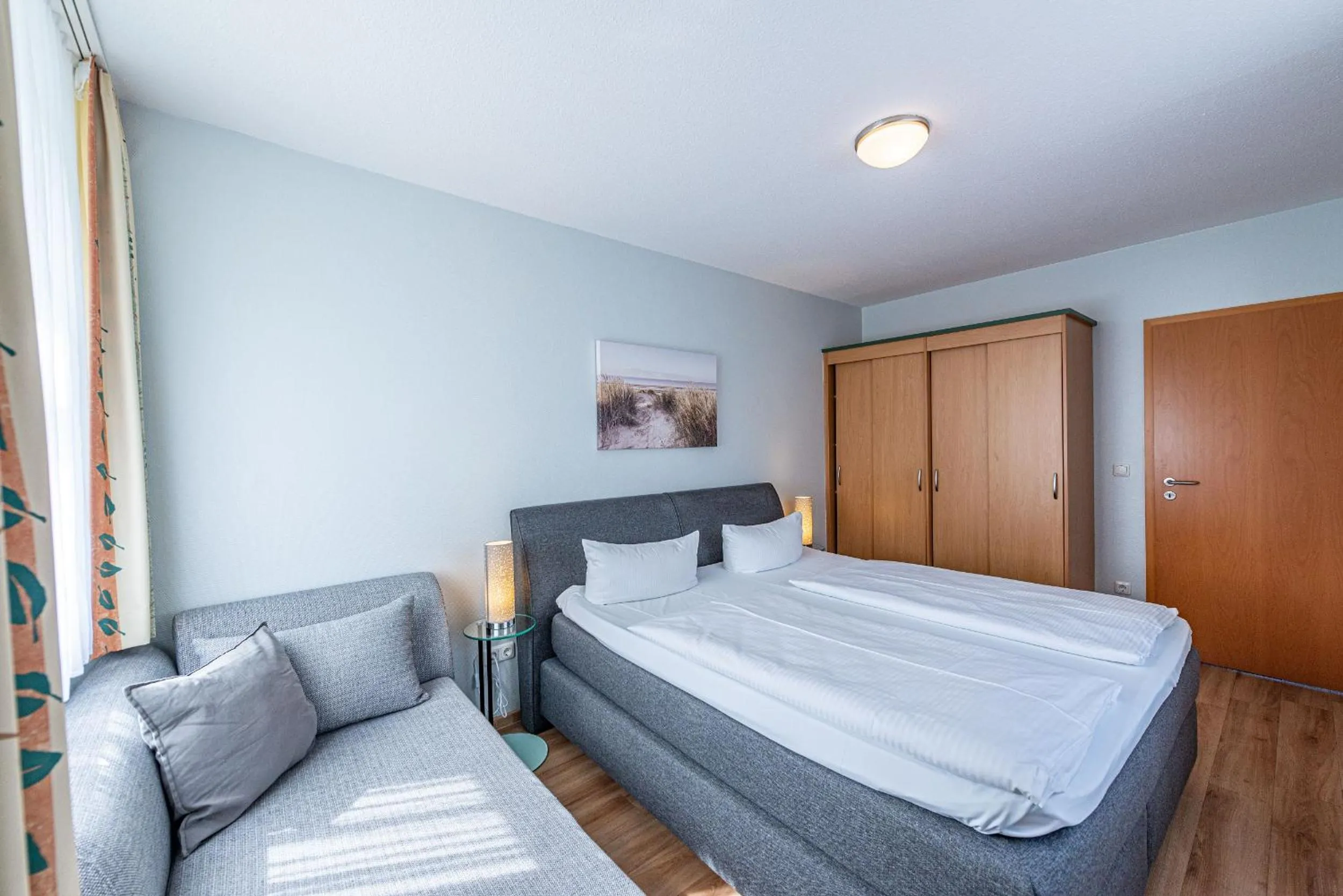 Photo of the whole room, Bed in Am Weststrand Apartmenthaus Waldeck