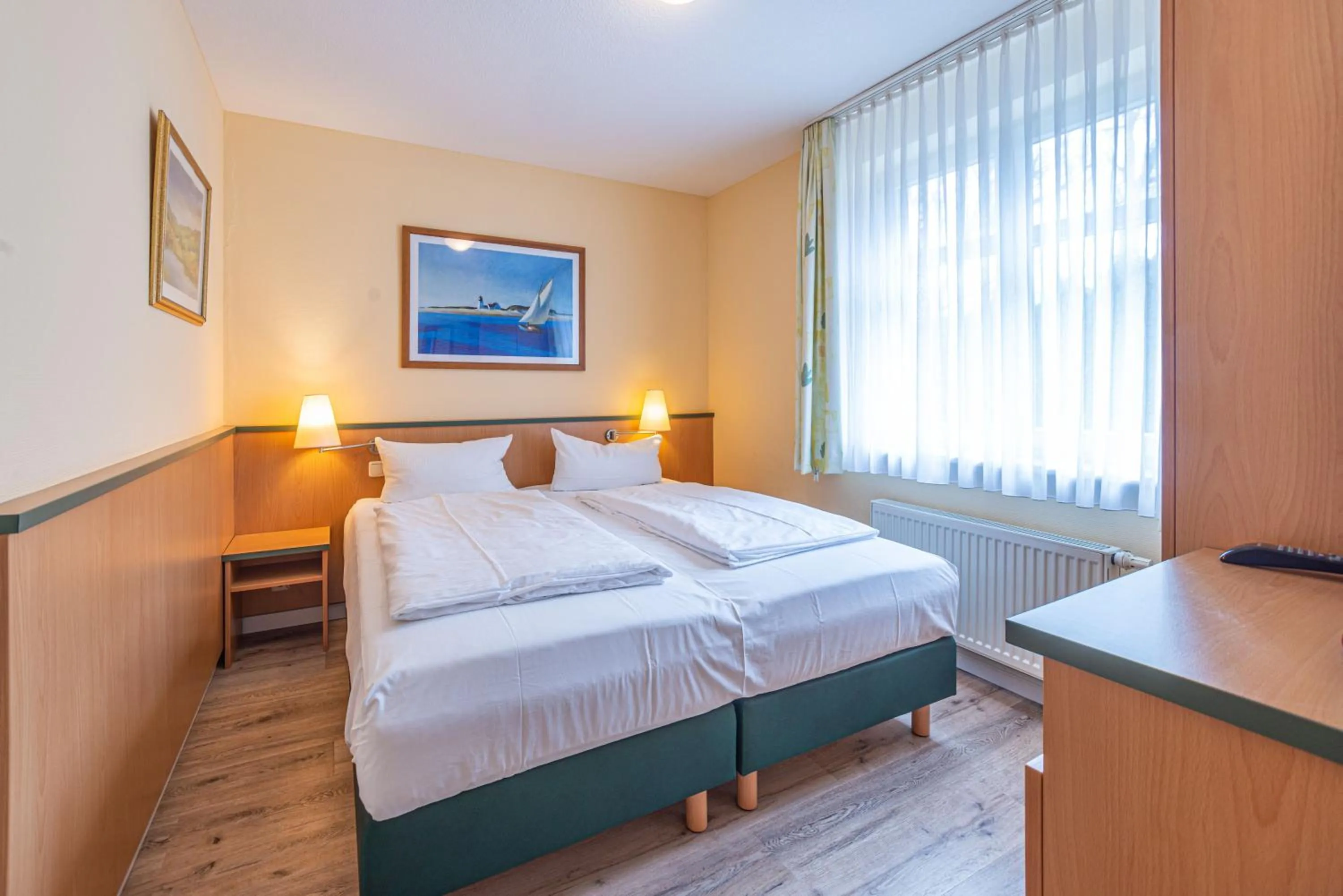 Photo of the whole room, Bed in Am Weststrand Apartmenthaus Waldeck