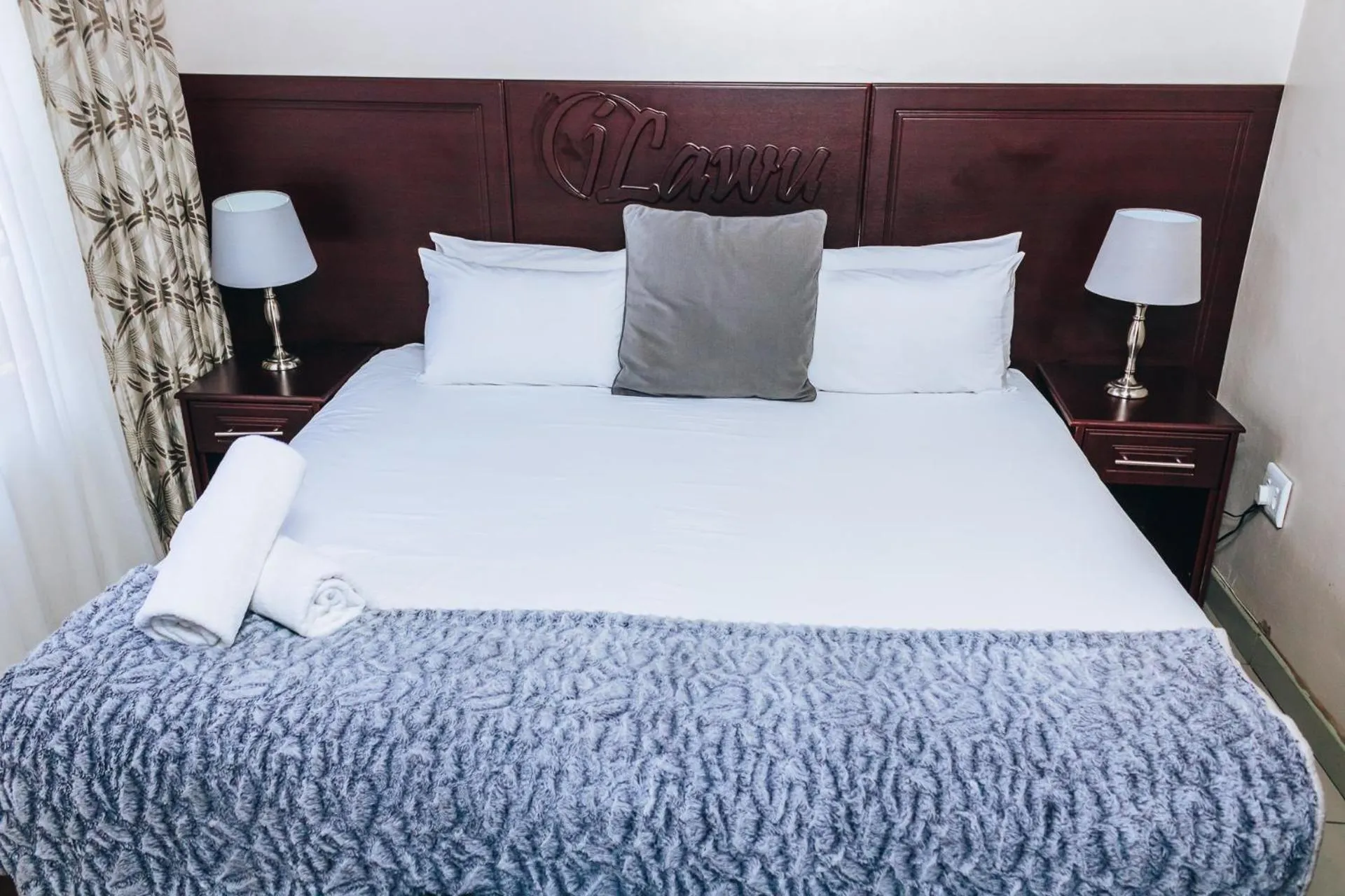 Bed in New England Guest House by Ilawu