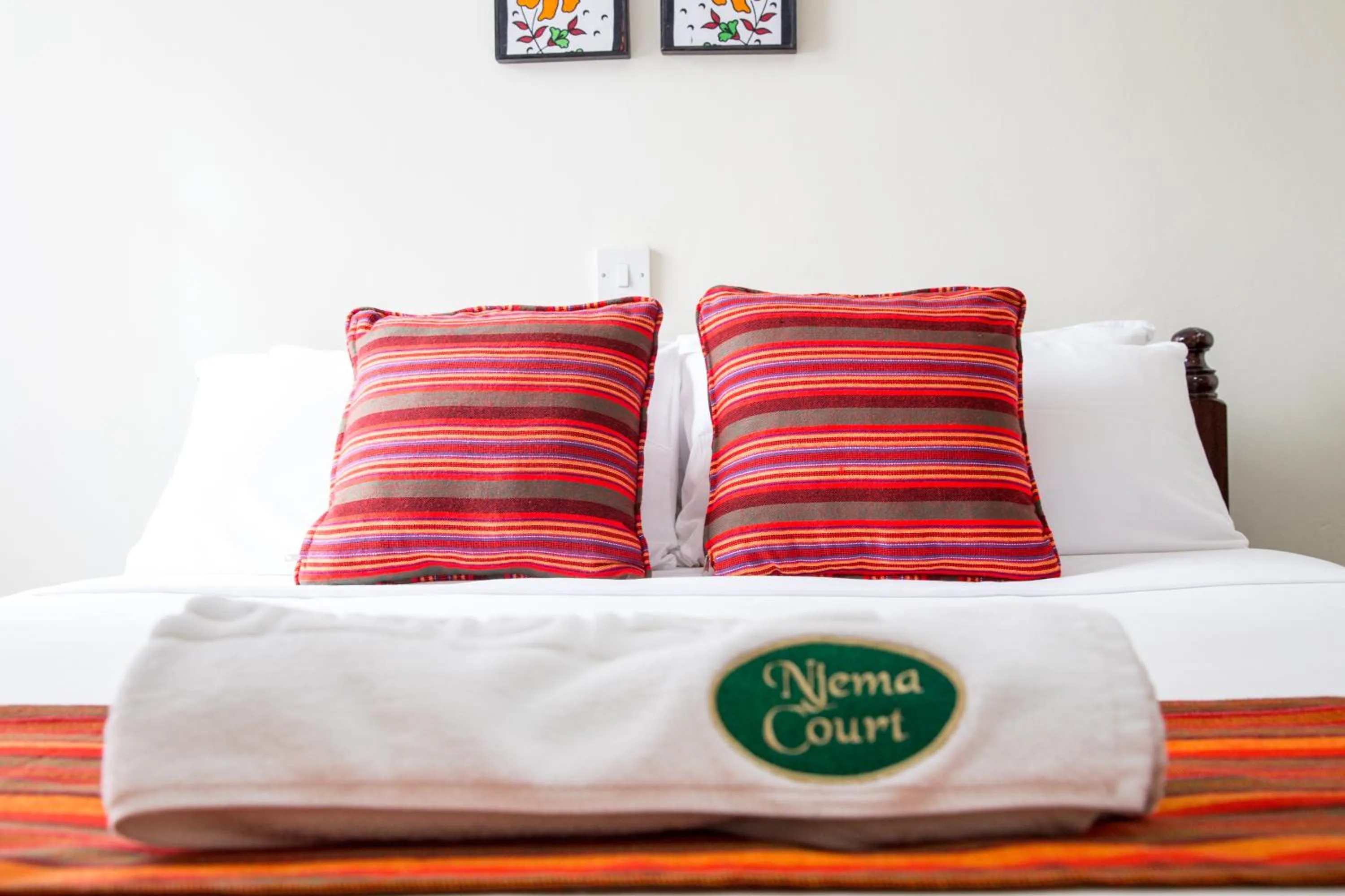 Bed in Njema Court Apartment
