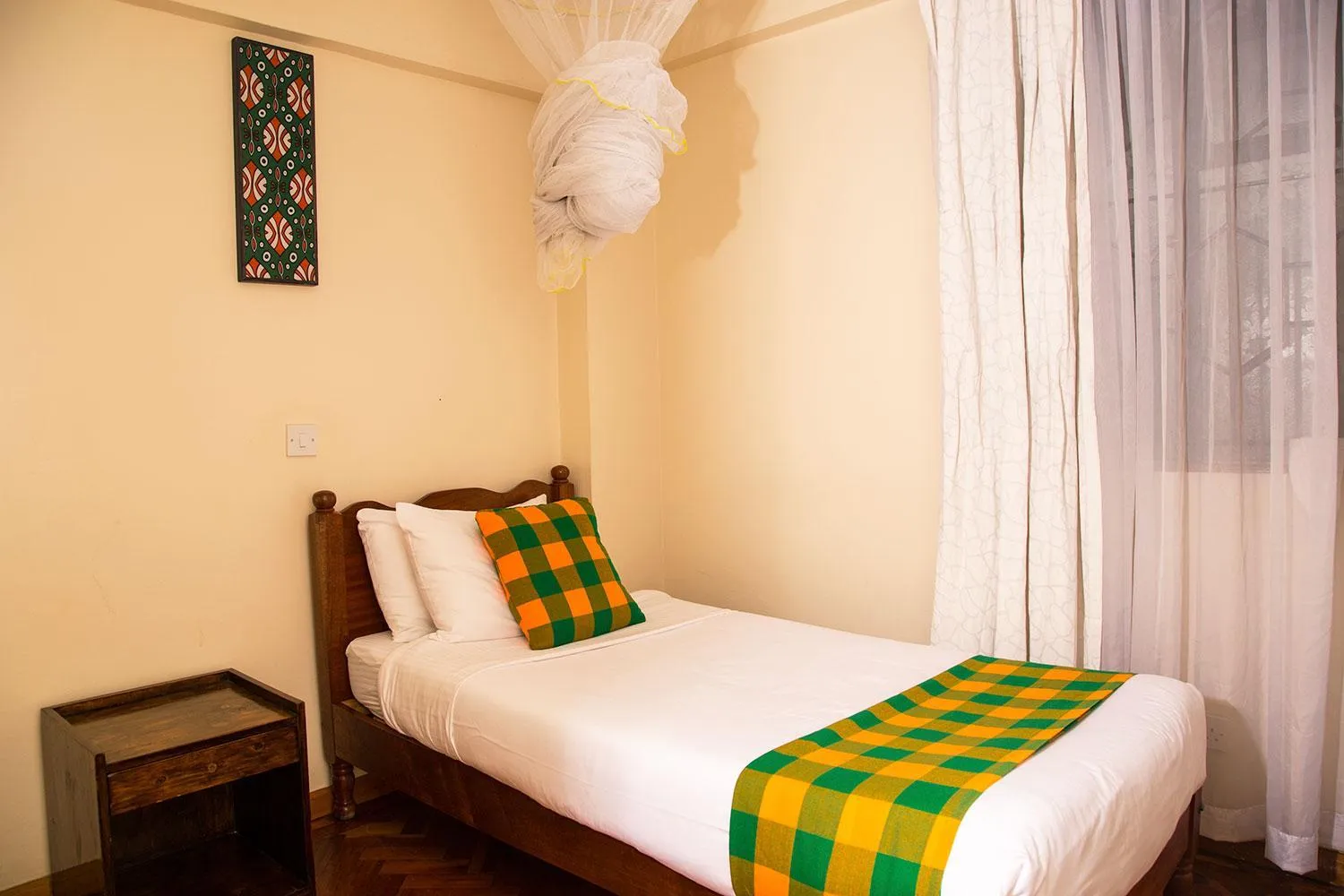 Bed in Njema Court Apartment