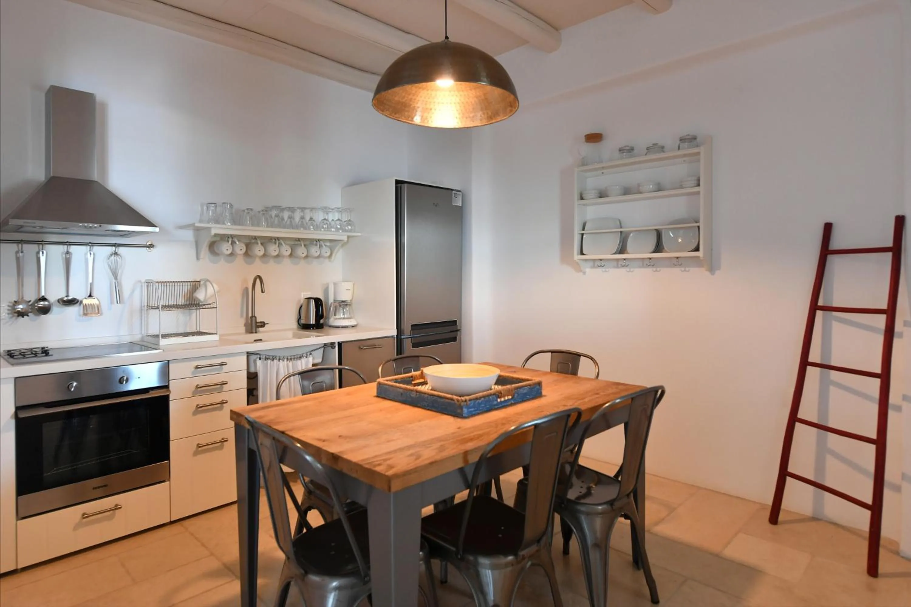 Kitchen or kitchenette in Kalypso Villas