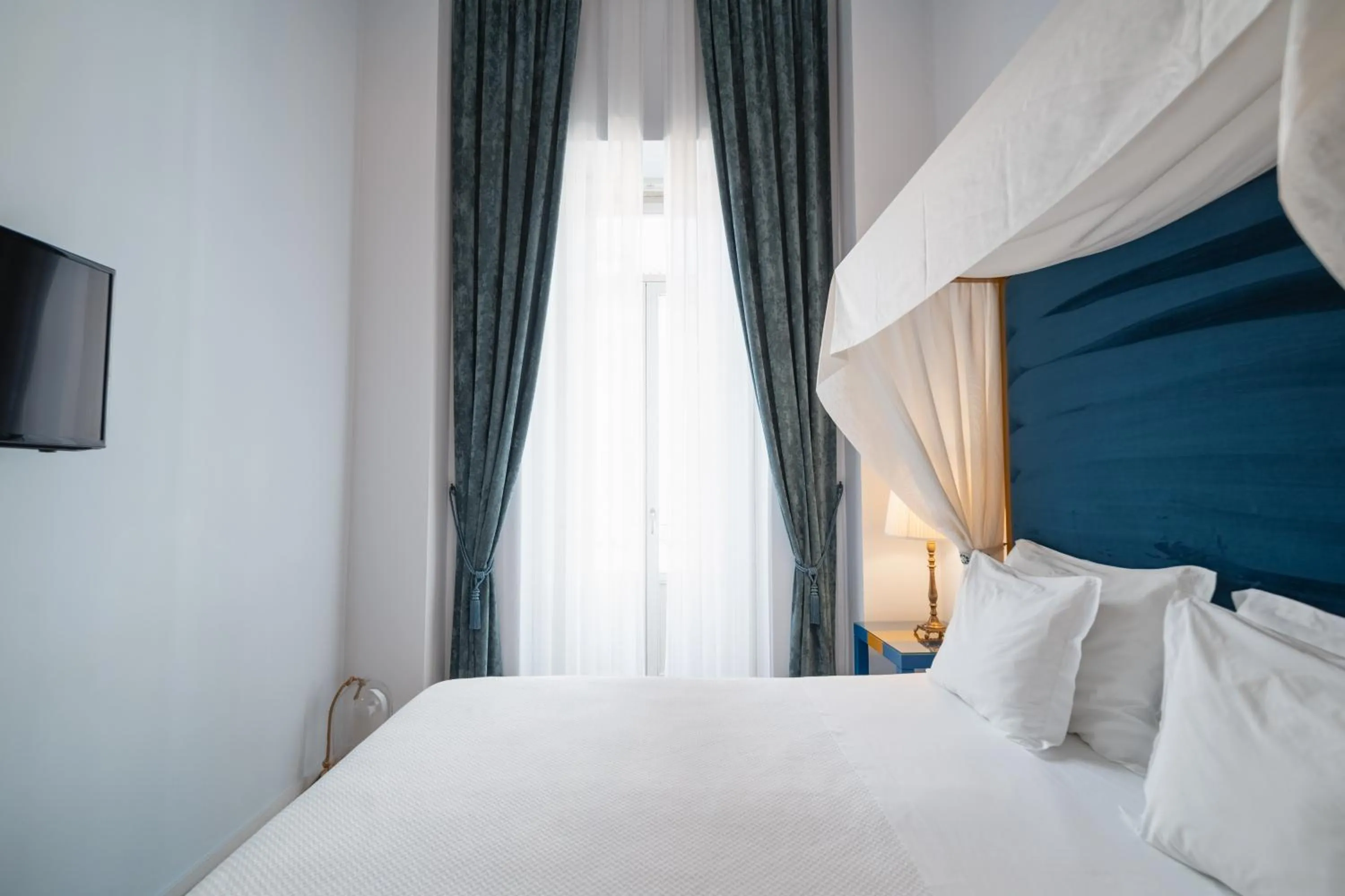 Bed in Burgus Tribute & Design Hotel