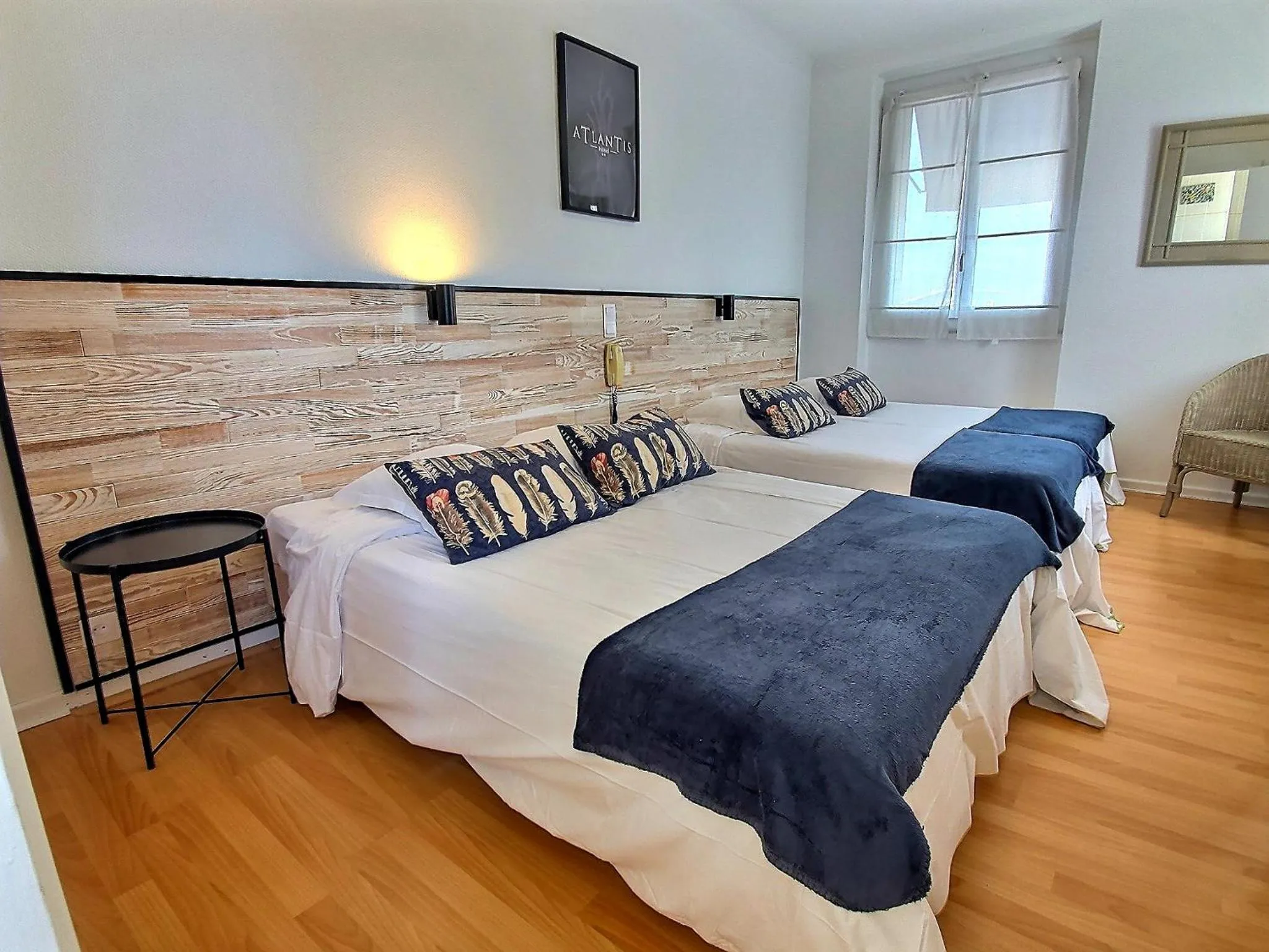 Bed in Atlantis Hôtel