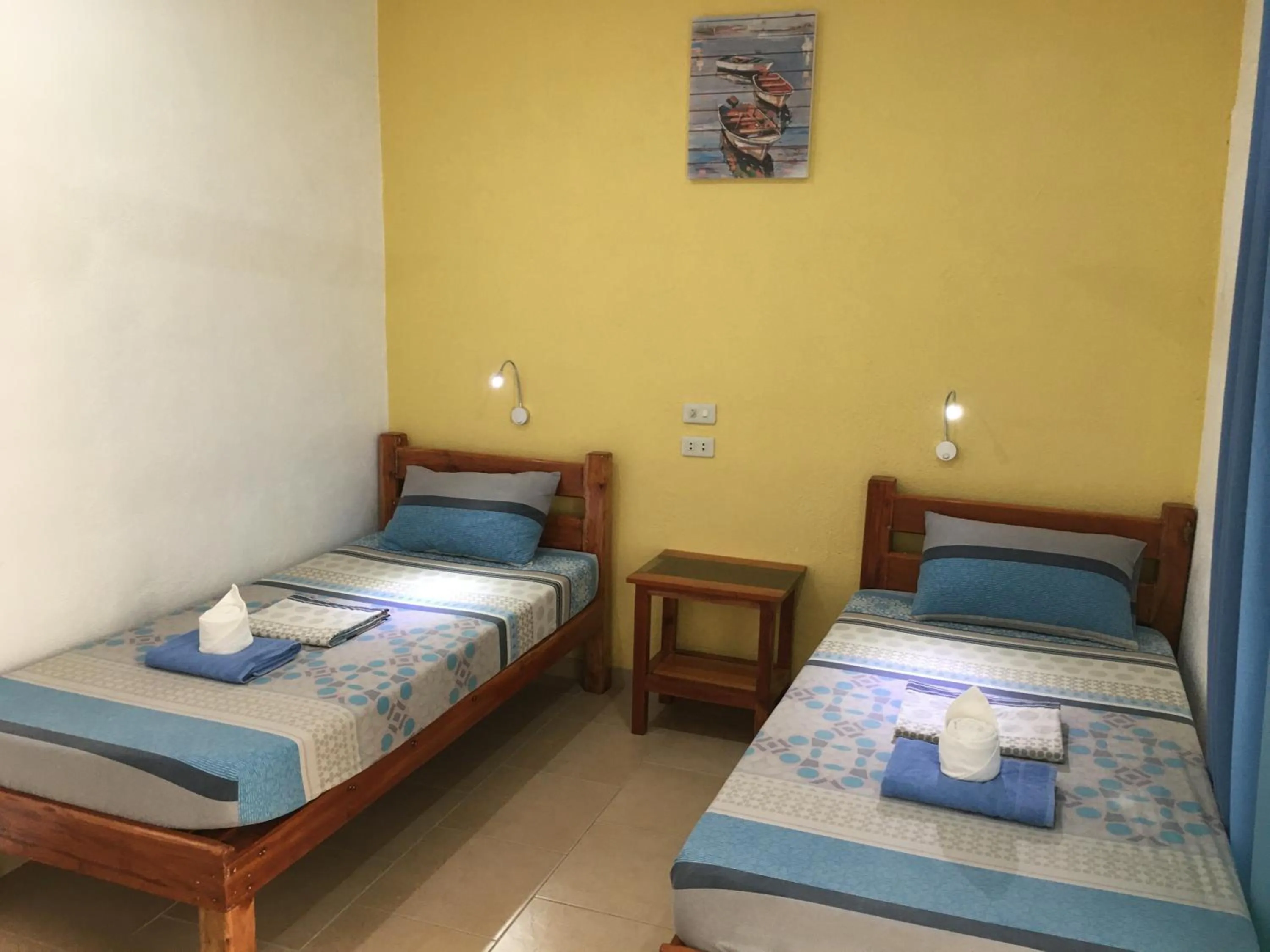 Bed in Alona Gecko Inn