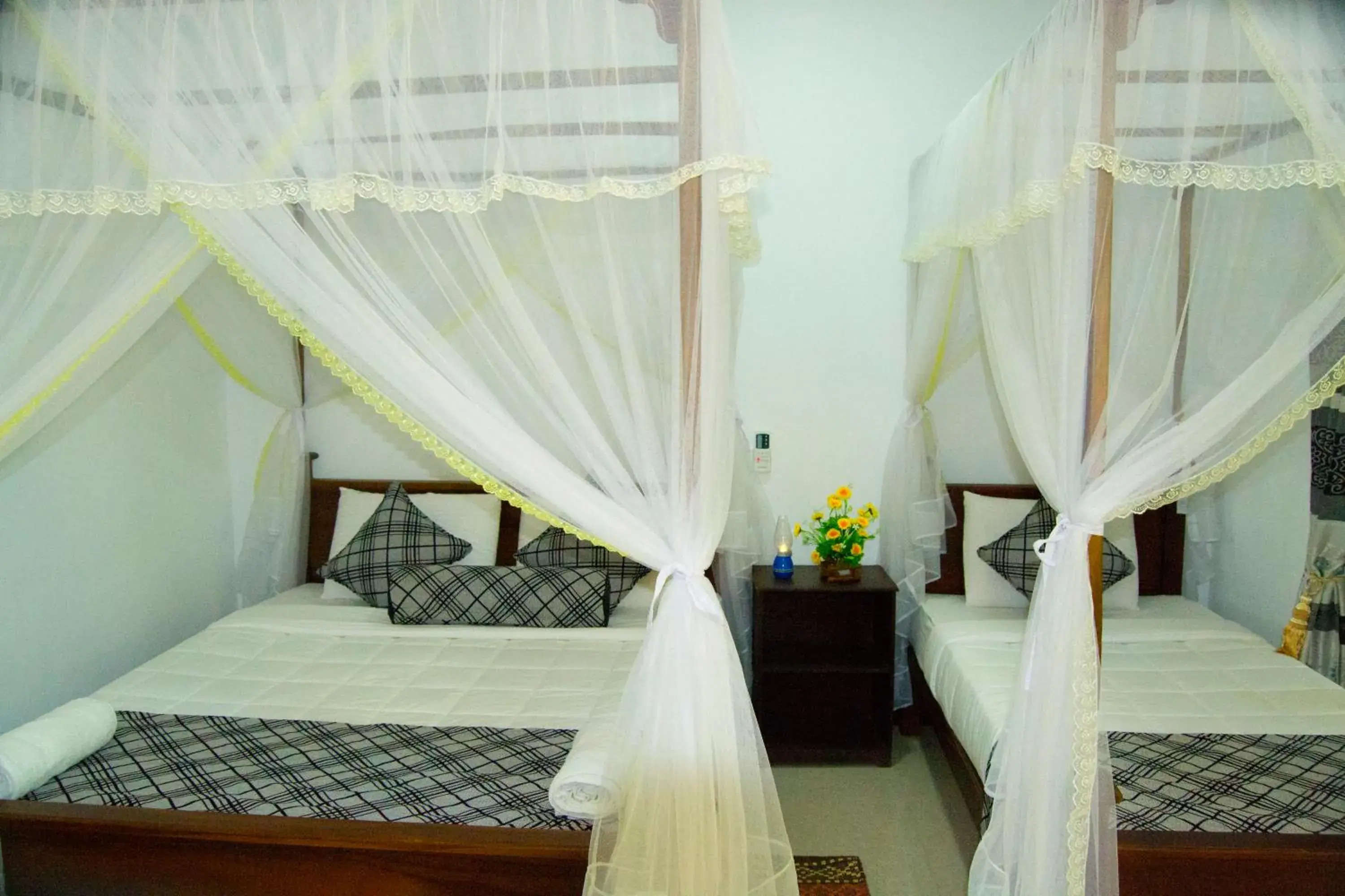 Deluxe Triple Room in Sigiriya Rock Gate Resort Deluxe Triple Room in Sigiriya Rock Gate Resort