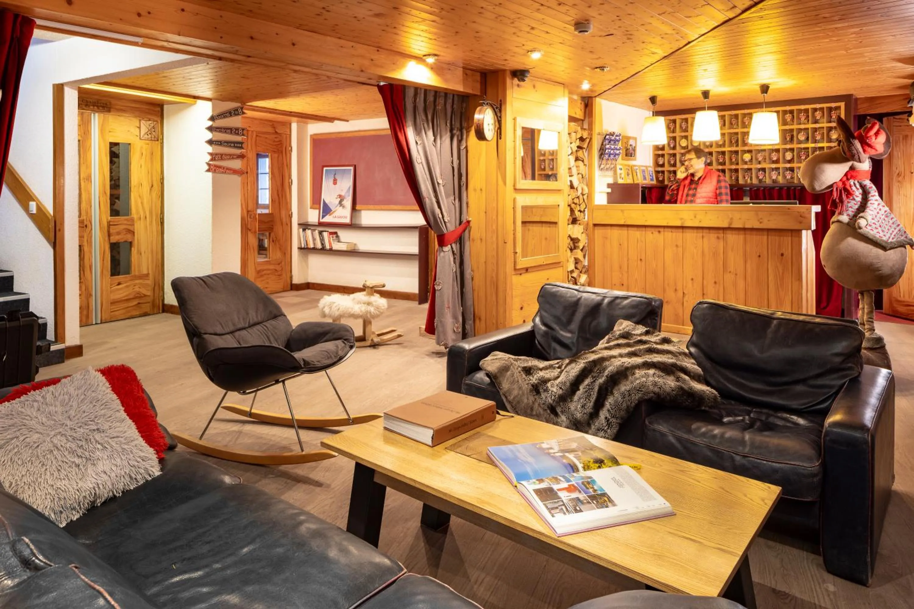 Lobby or reception in Hôtel du Bourg