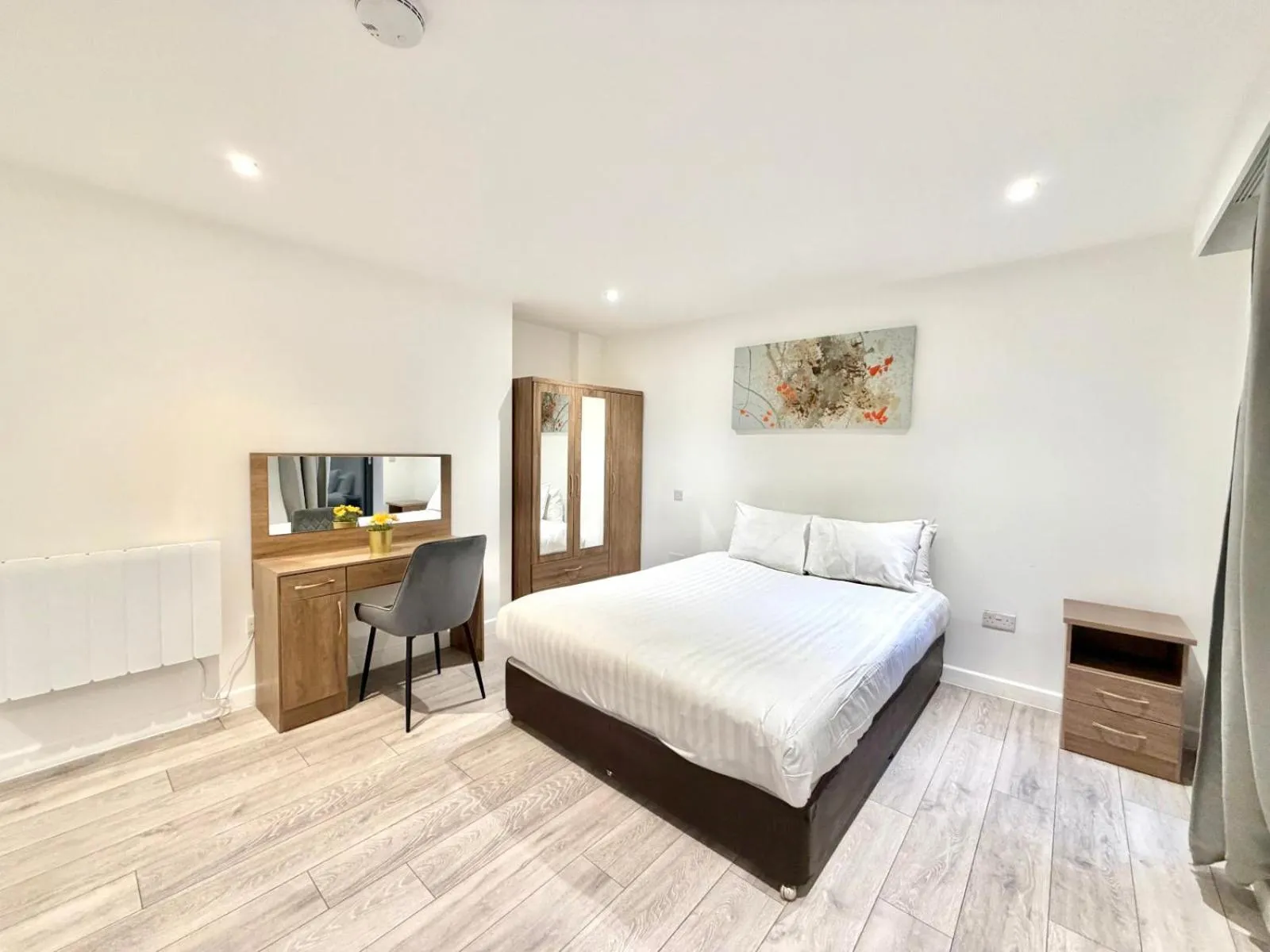 Bed in Hampton Suites Serviced Apartments