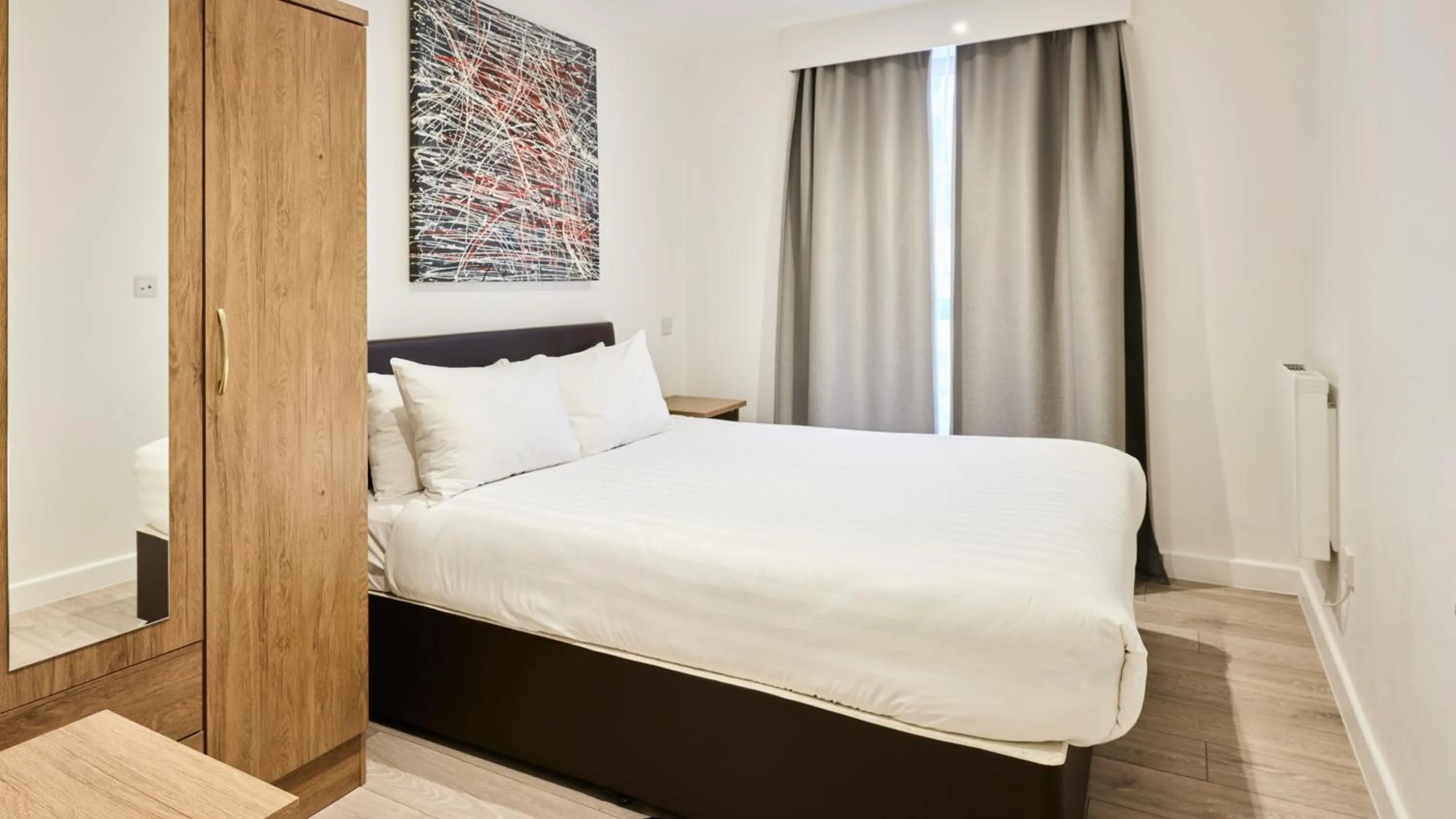Bedroom, Bed in Hampton Suites Serviced Apartments