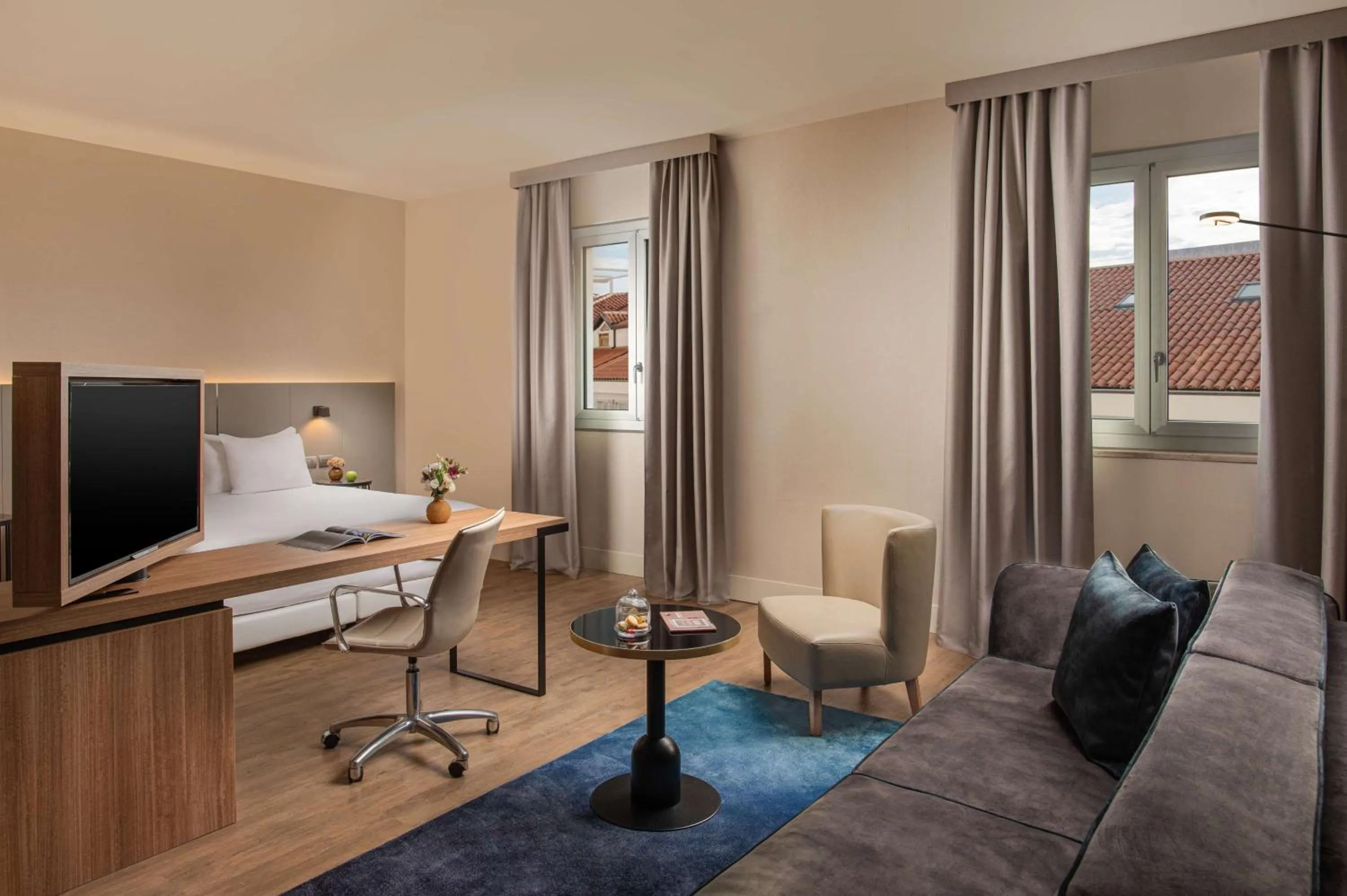 Photo of the whole room in NH Trieste