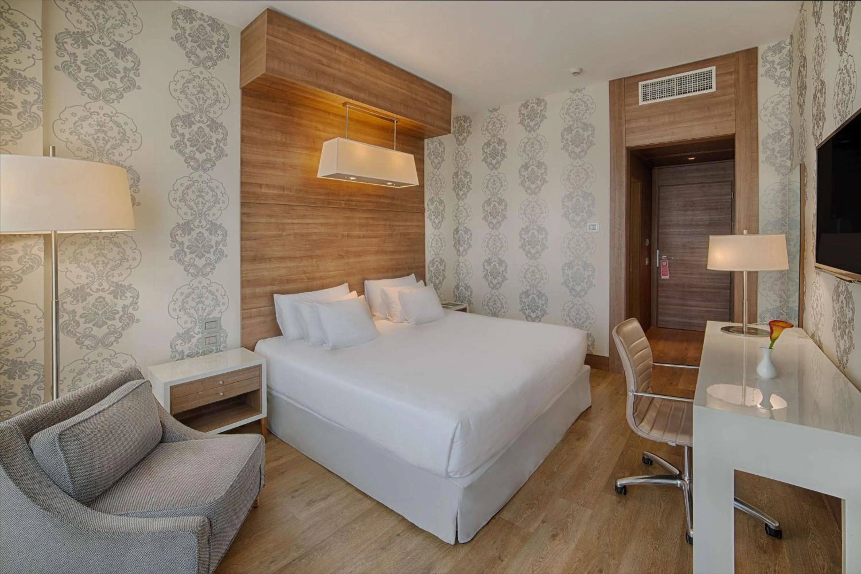 Family triple room in NH Collection Milano President