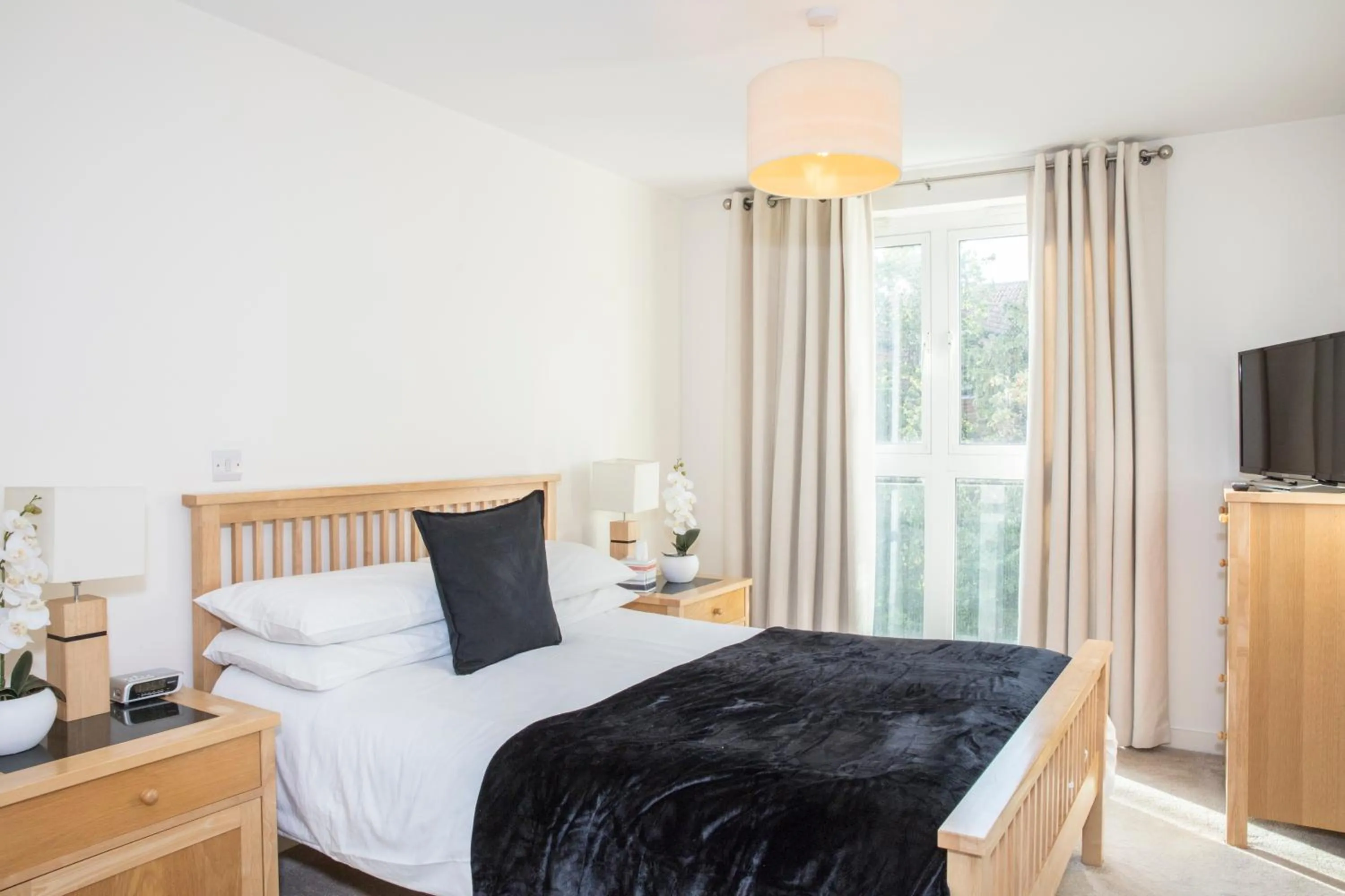 Bedroom in The Cedar Suite