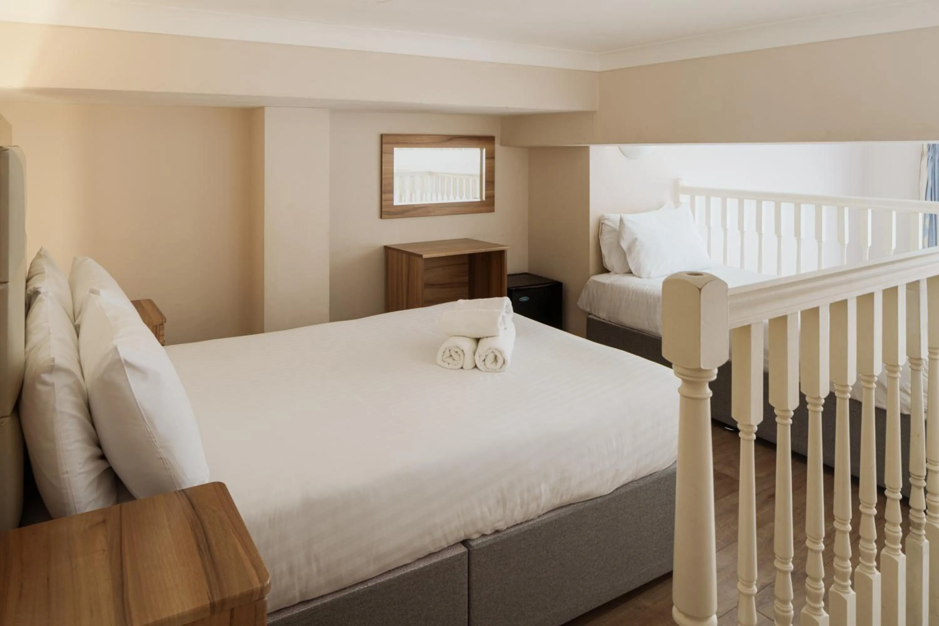 Bed in Royal Eagle Hotel