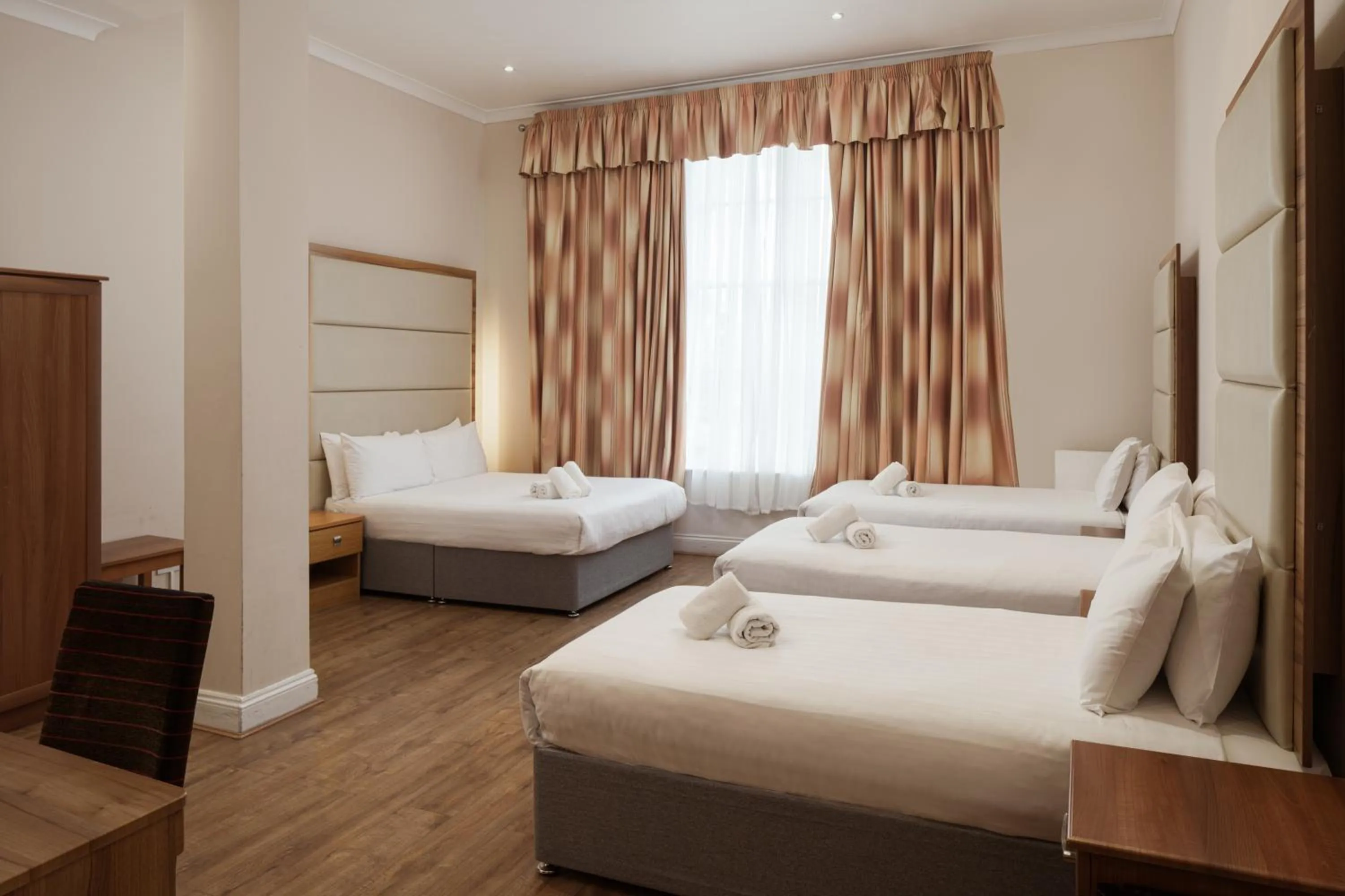 Bed in Royal Eagle Hotel