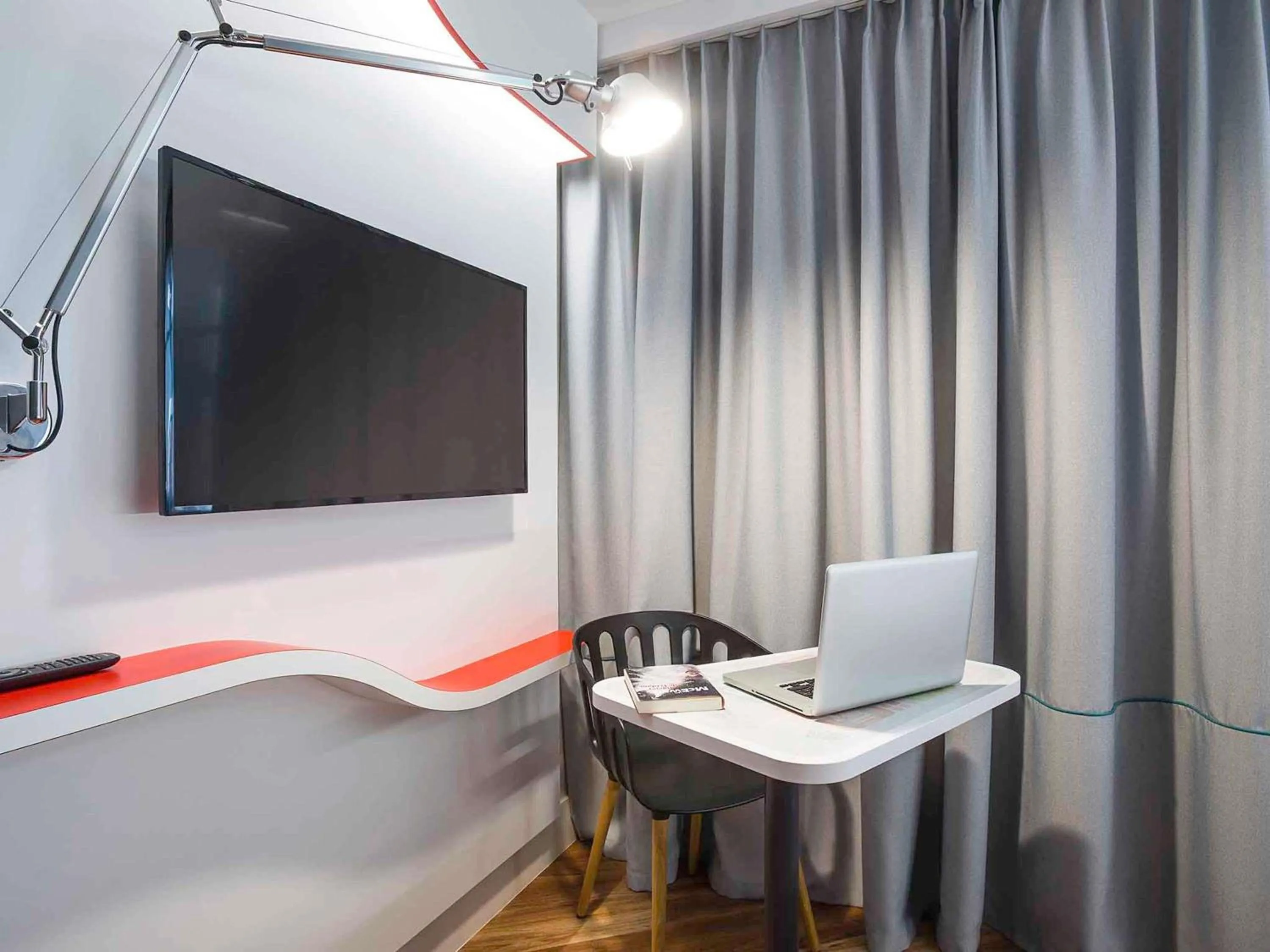 Bedroom in ibis Styles Deauville Centre