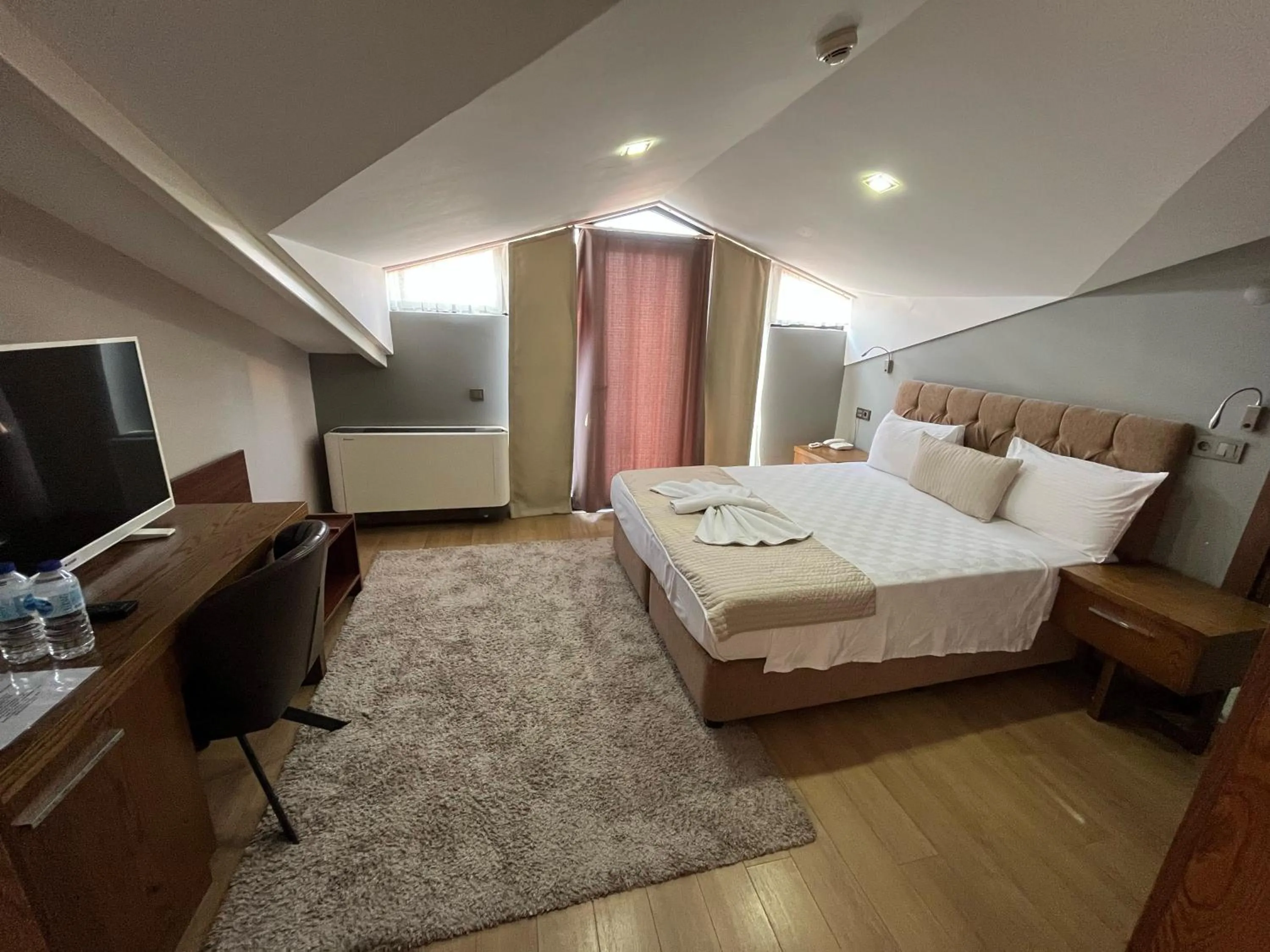 Bed in The Elegant Hotel