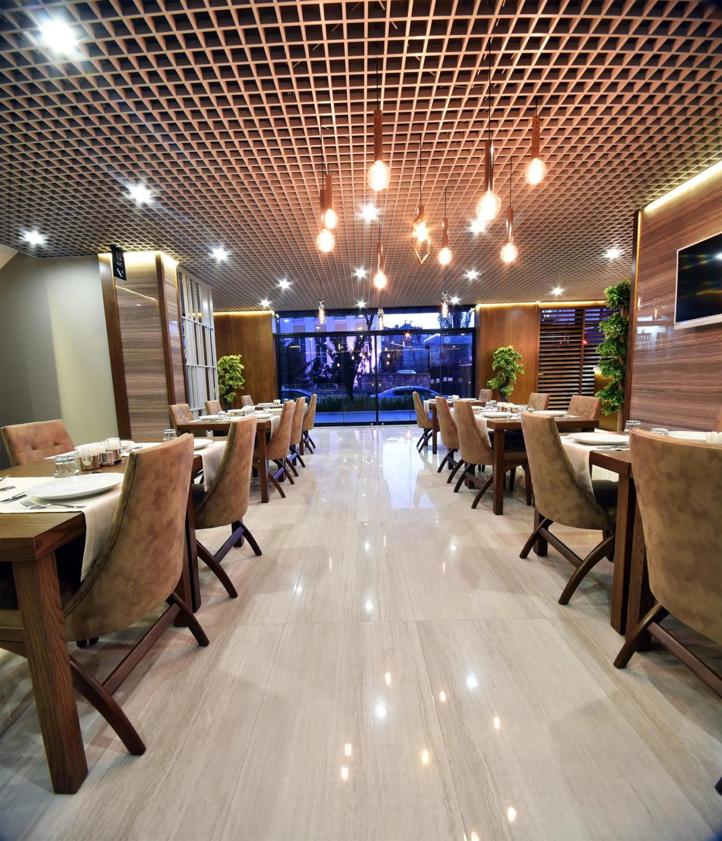 Communal lounge/ TV room in The Elegant Hotel