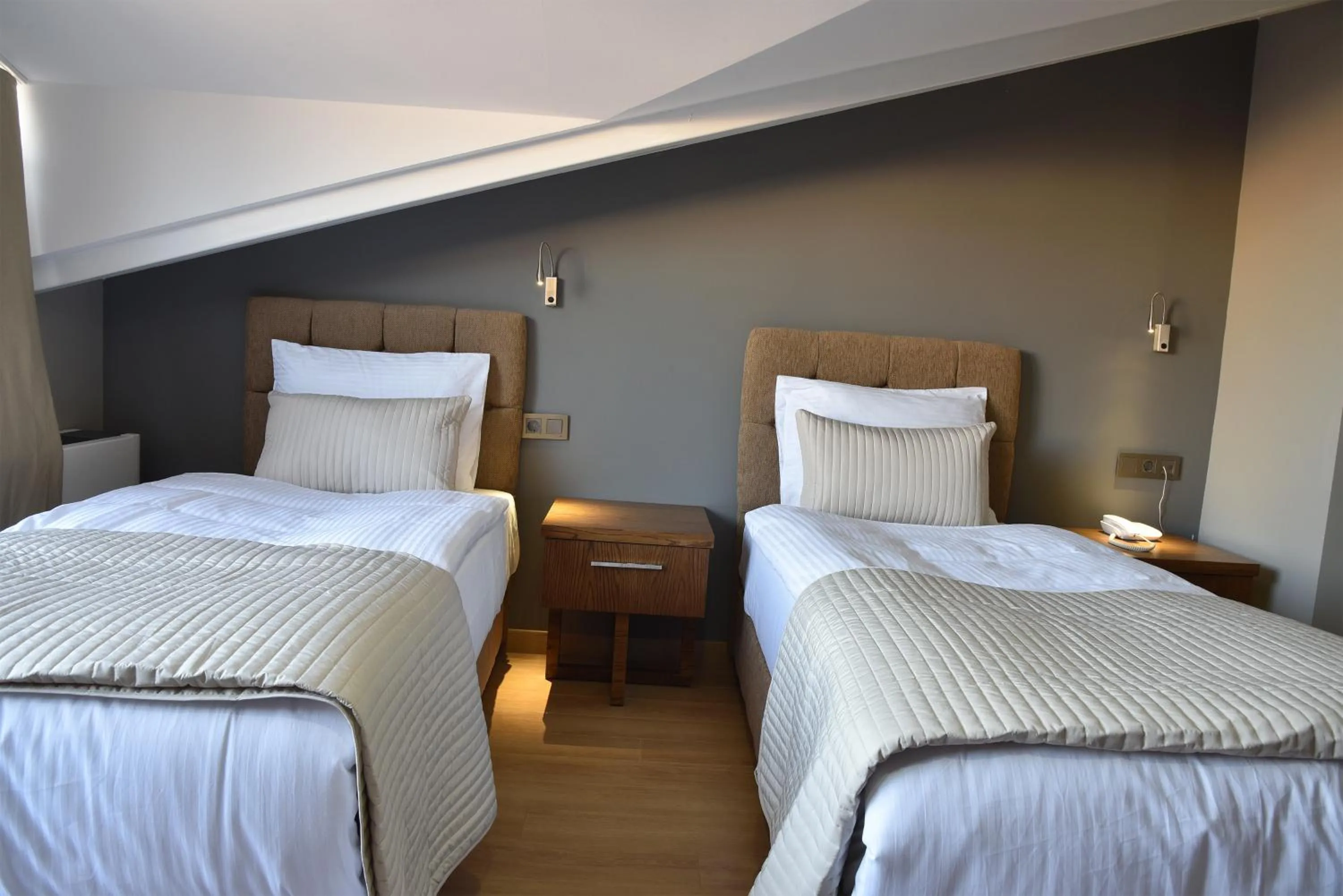 Bed in The Elegant Hotel