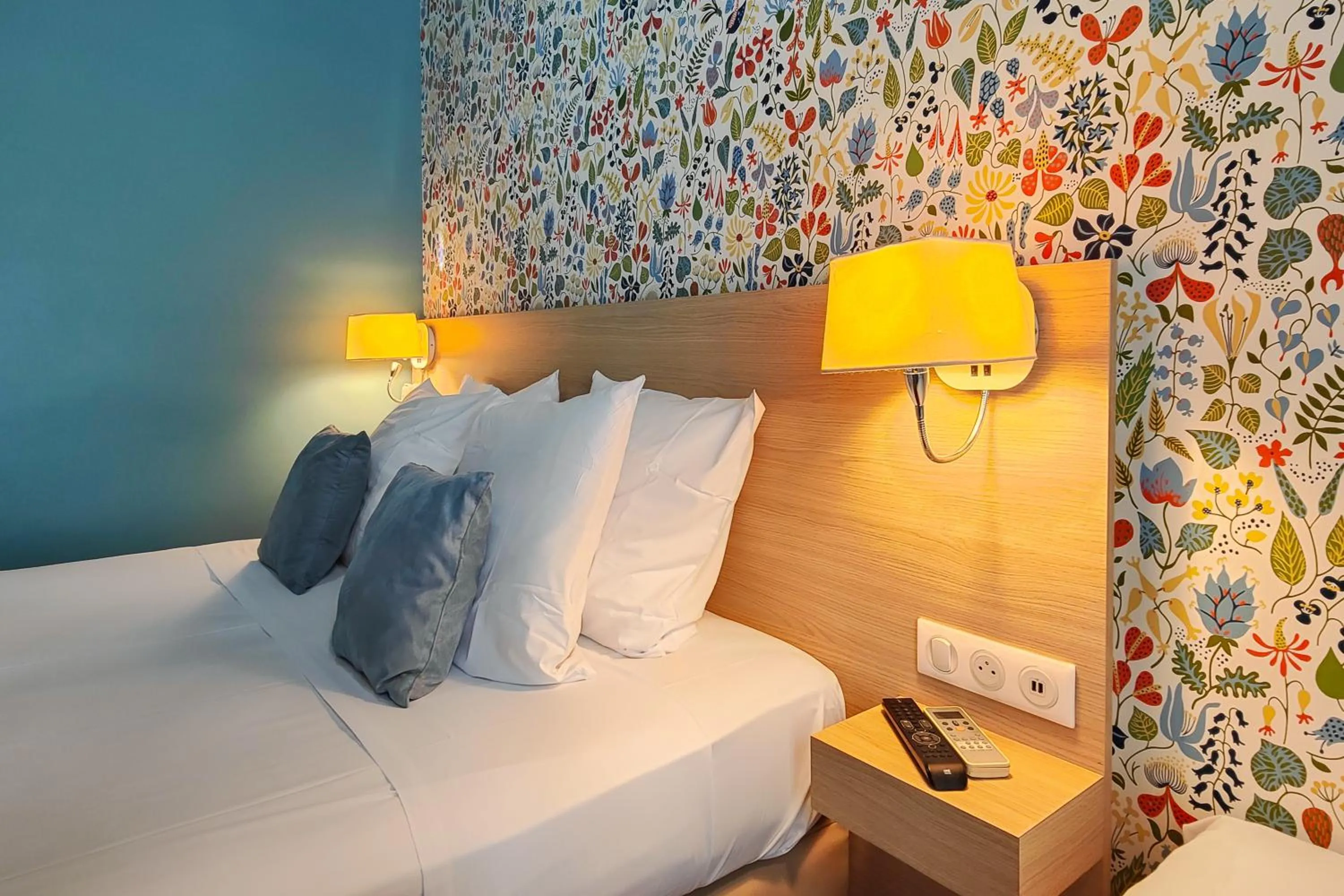 Bed in Hôtel Du Centre, un hôtel AMMI