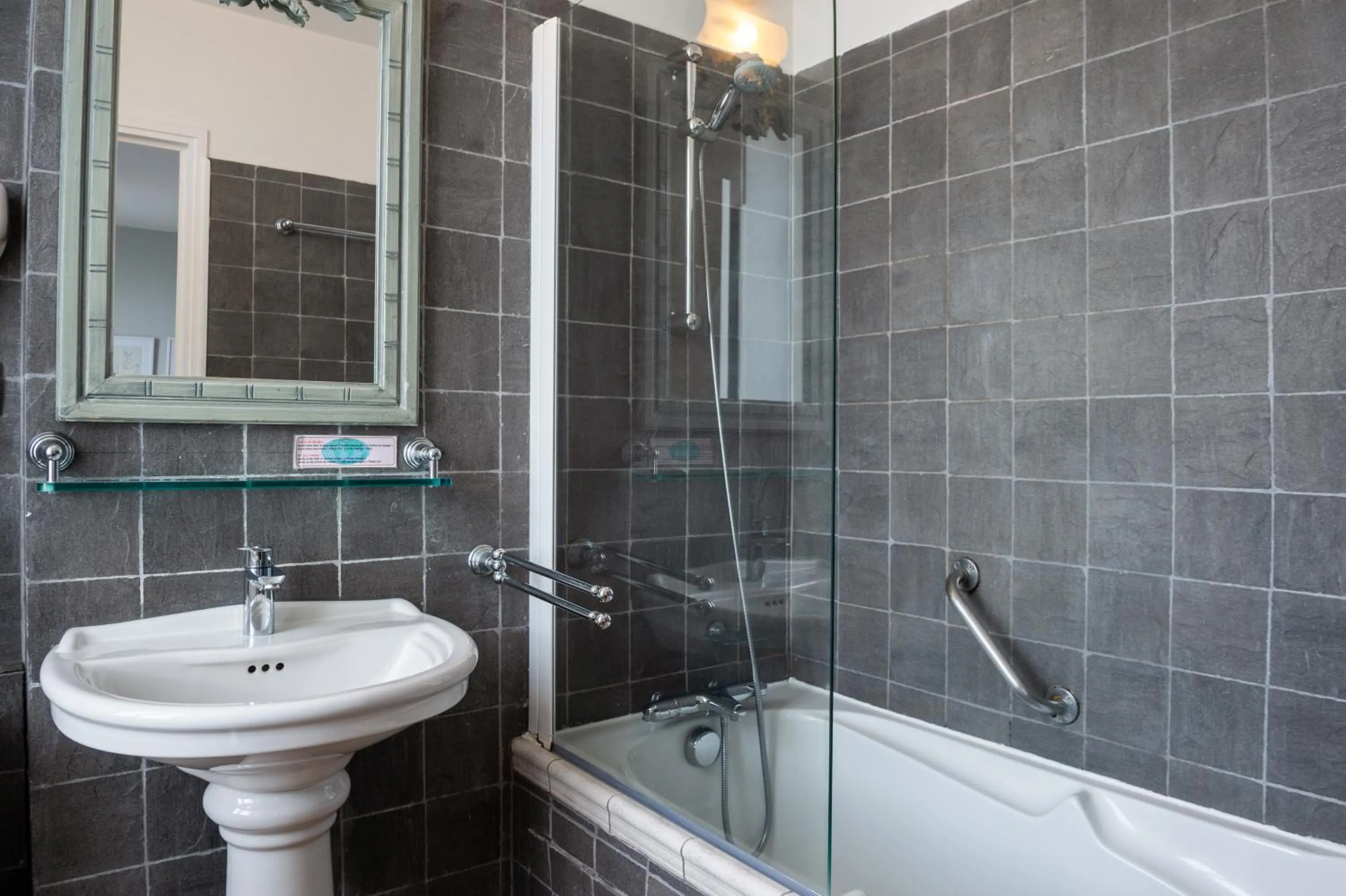 Shower in Hôtel Traiteur Les Ormes, The Originals Relais