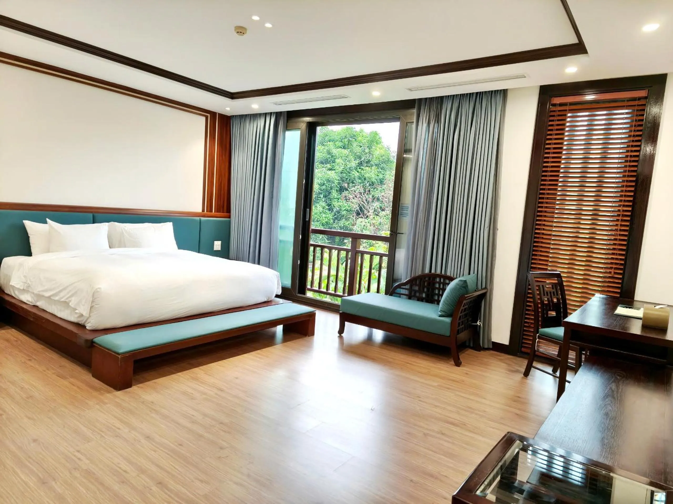 Bed in NCC Garden Villas - NCC Hotel