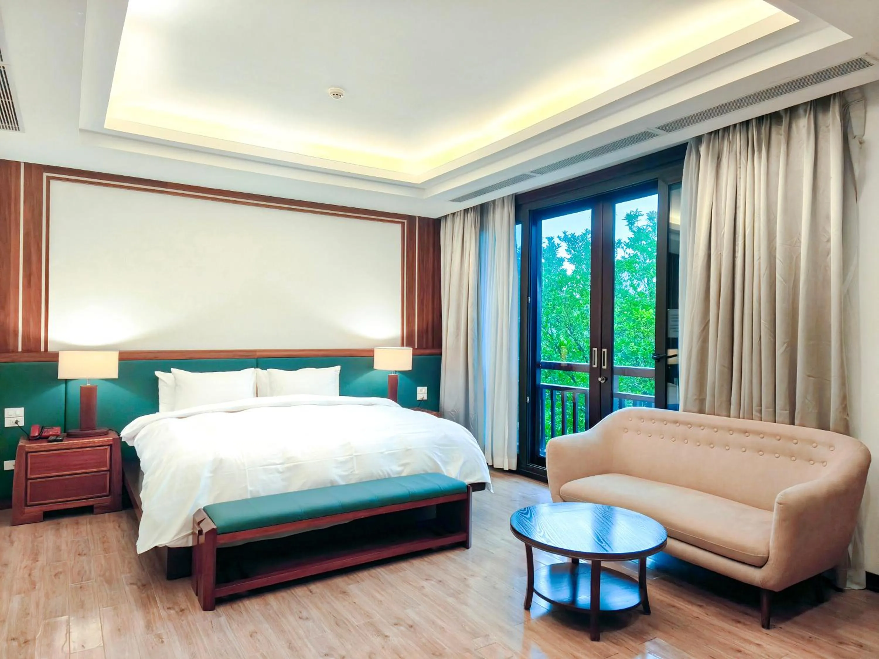 Bed in NCC Garden Villas - NCC Hotel
