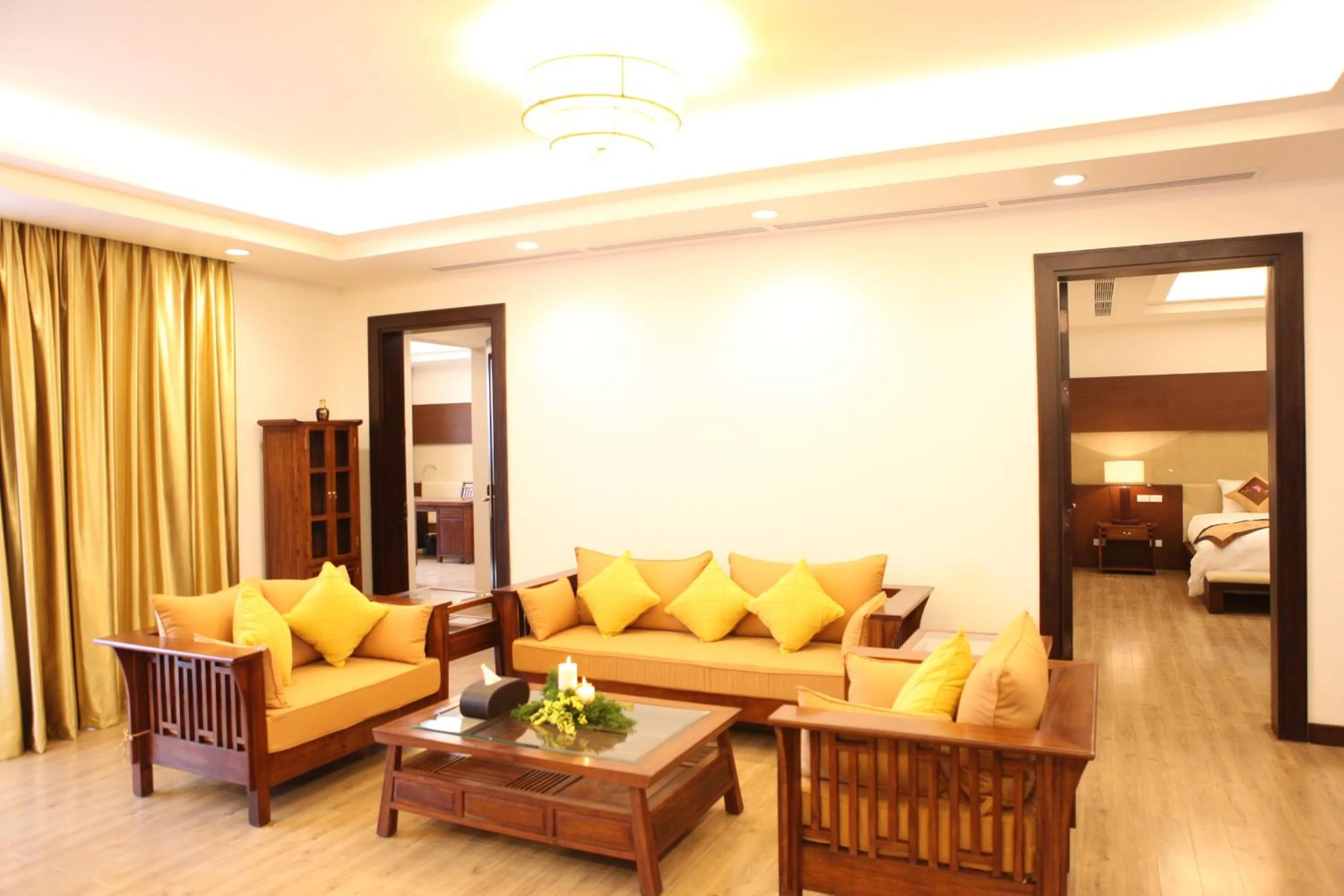 Communal lounge/ TV room, Bed in NCC Garden Villas - NCC Hotel