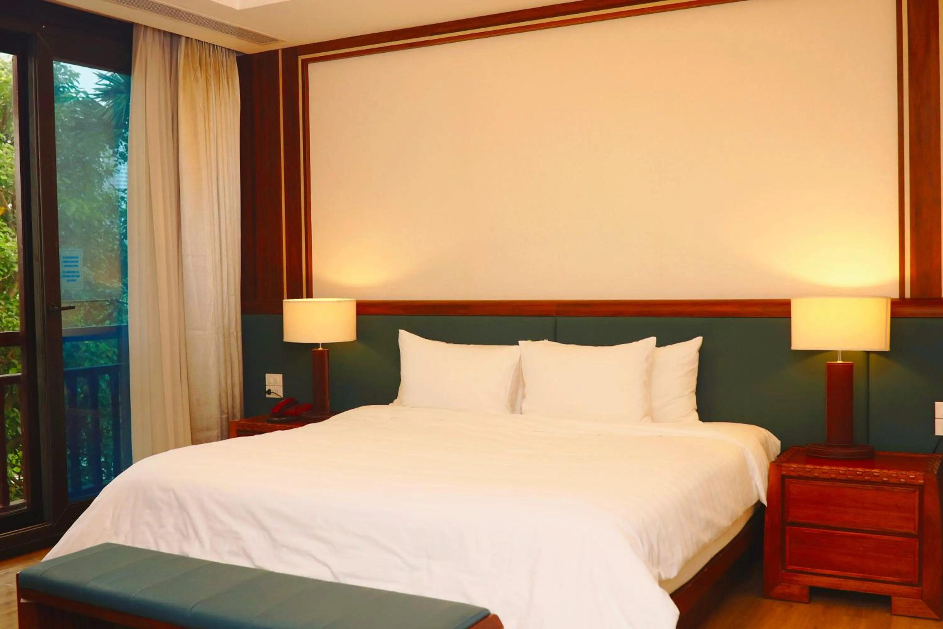 Bed in NCC Garden Villas - NCC Hotel