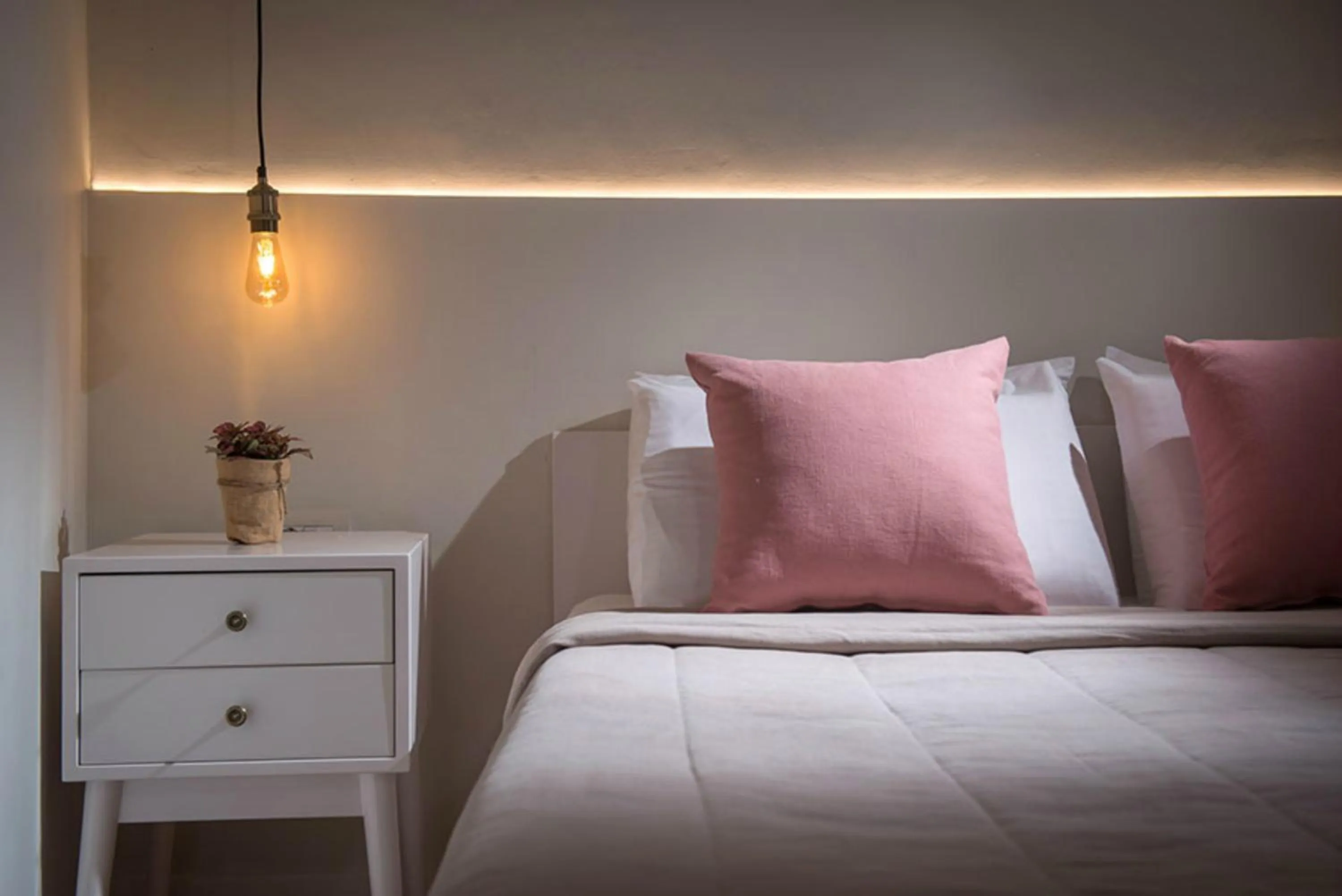 Bed in Veneziano Boutique Hotel