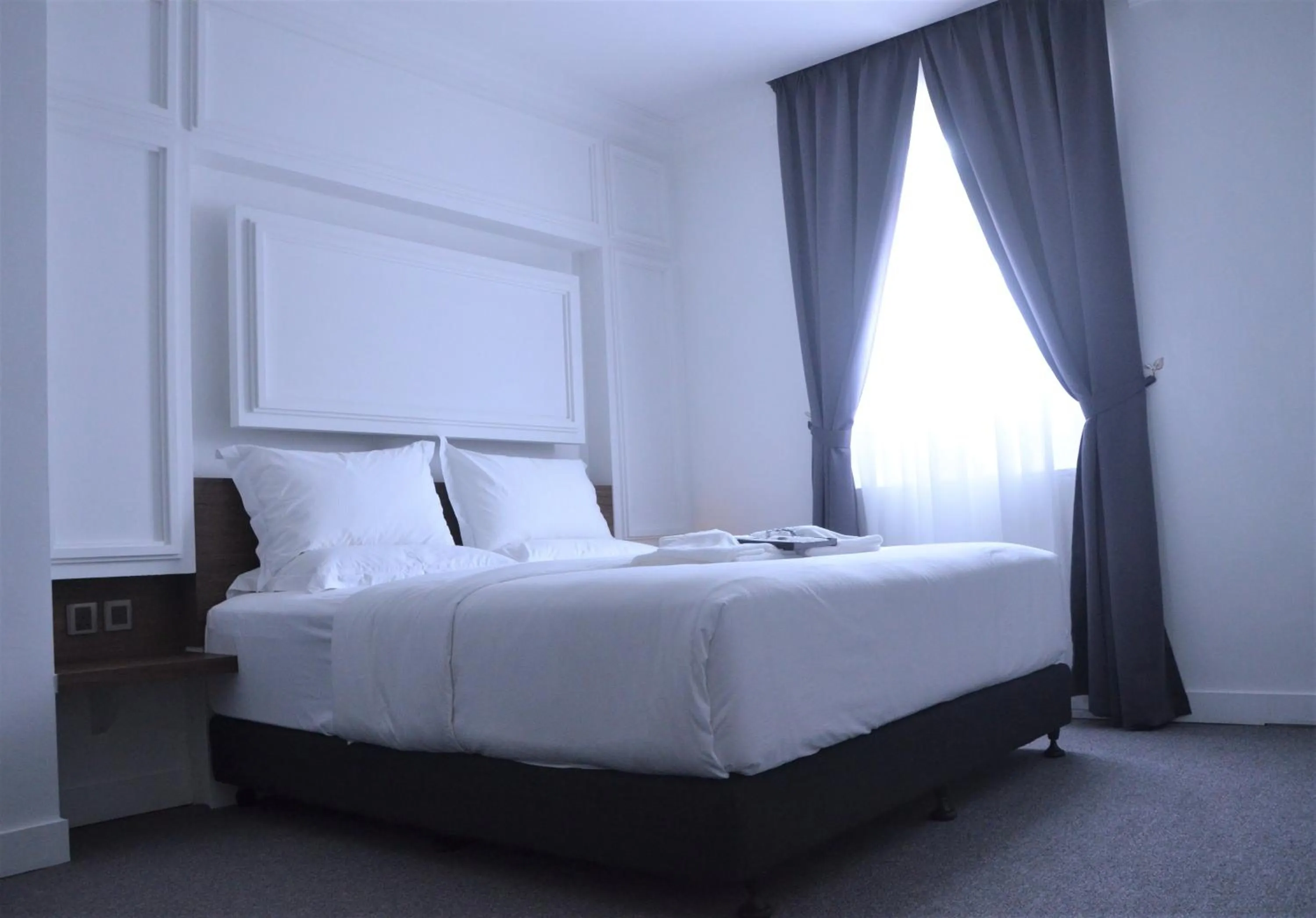 Bed in TheBlanc Boutique Hotel