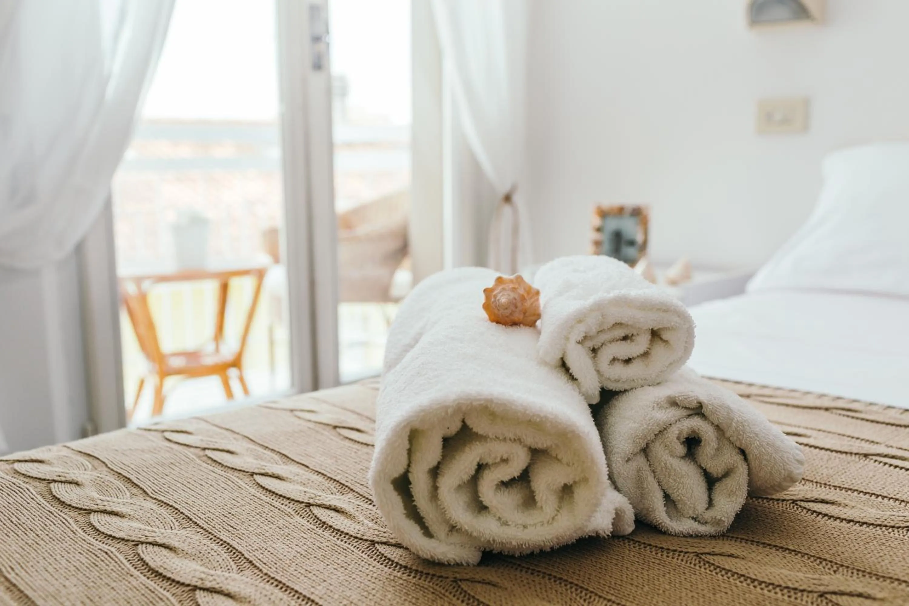 Bed in De La Ville Hotel