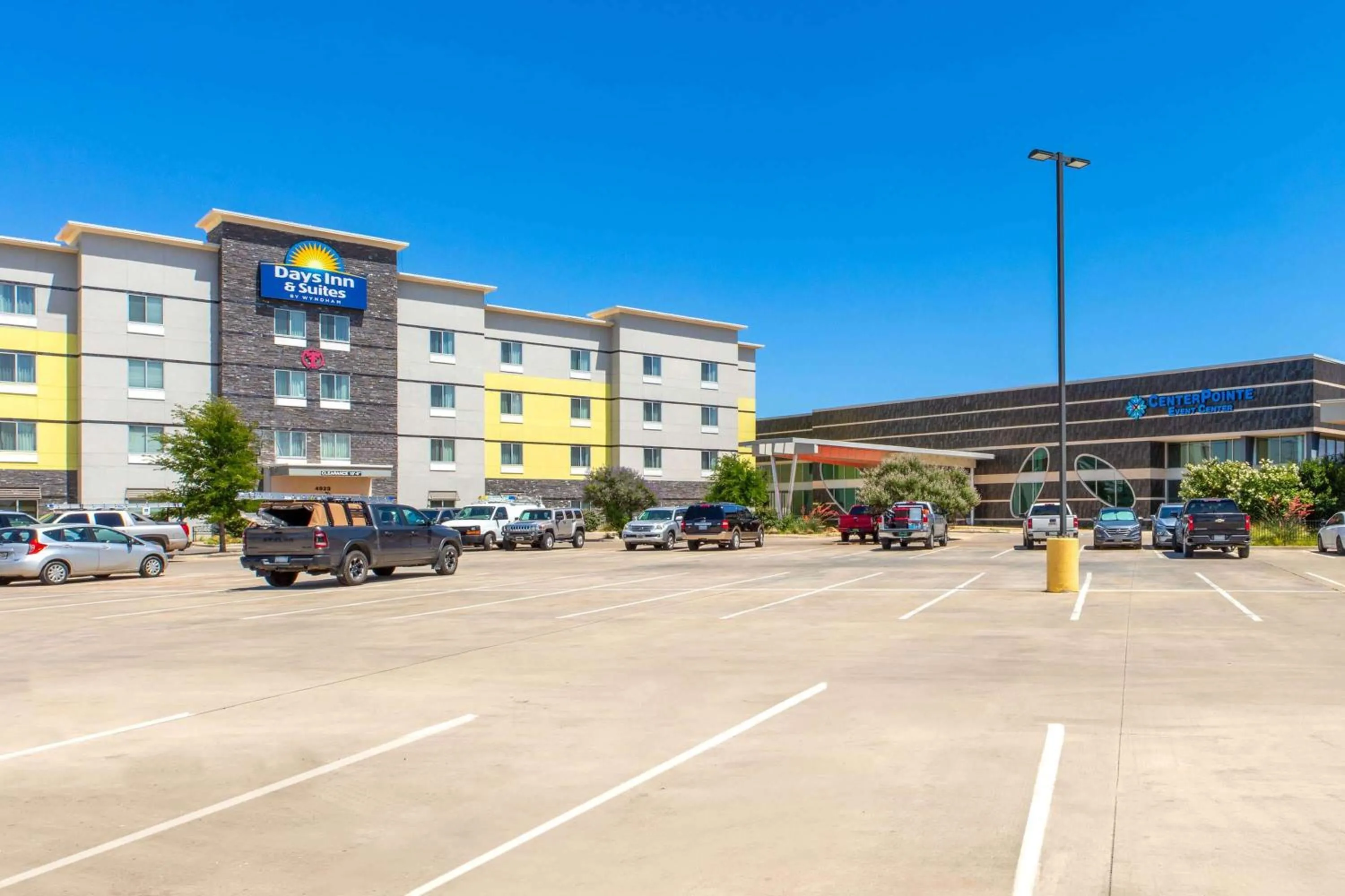 Property building in Days Inn & Suites by Wyndham Lubbock Medical Center