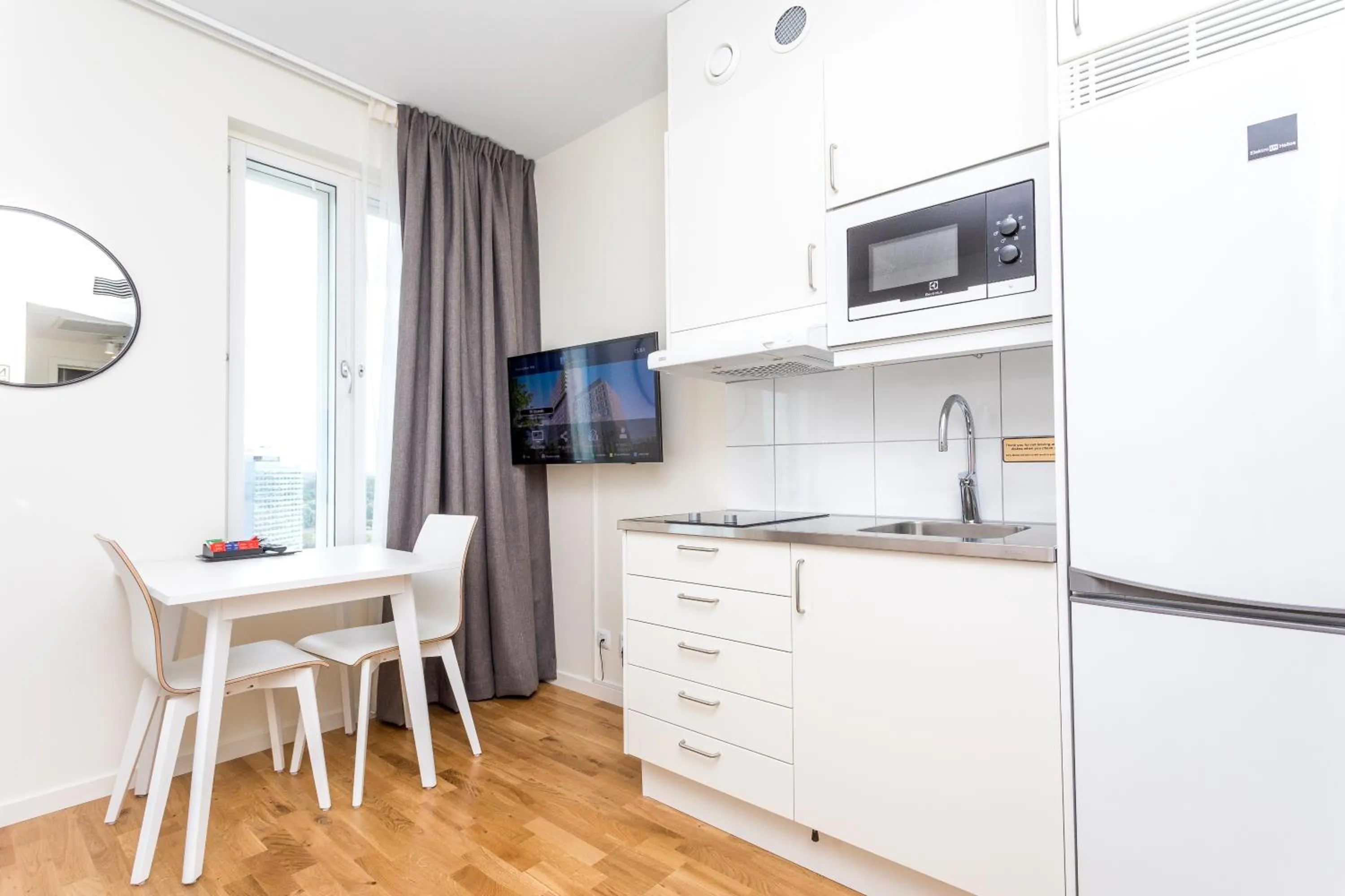 Kitchen or kitchenette in ApartDirect Älvsjö
