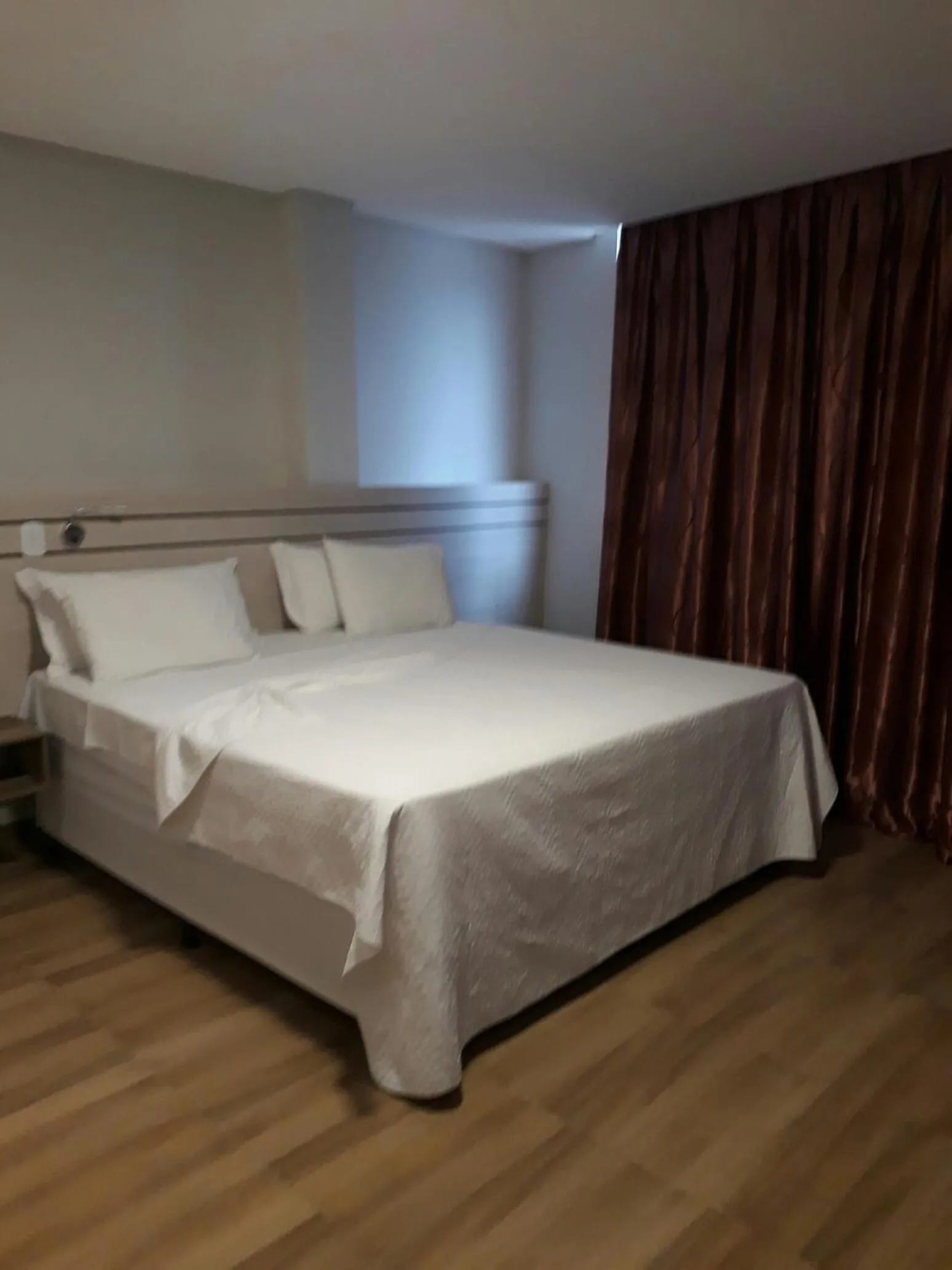 Bed in Pak Suítes Hotel