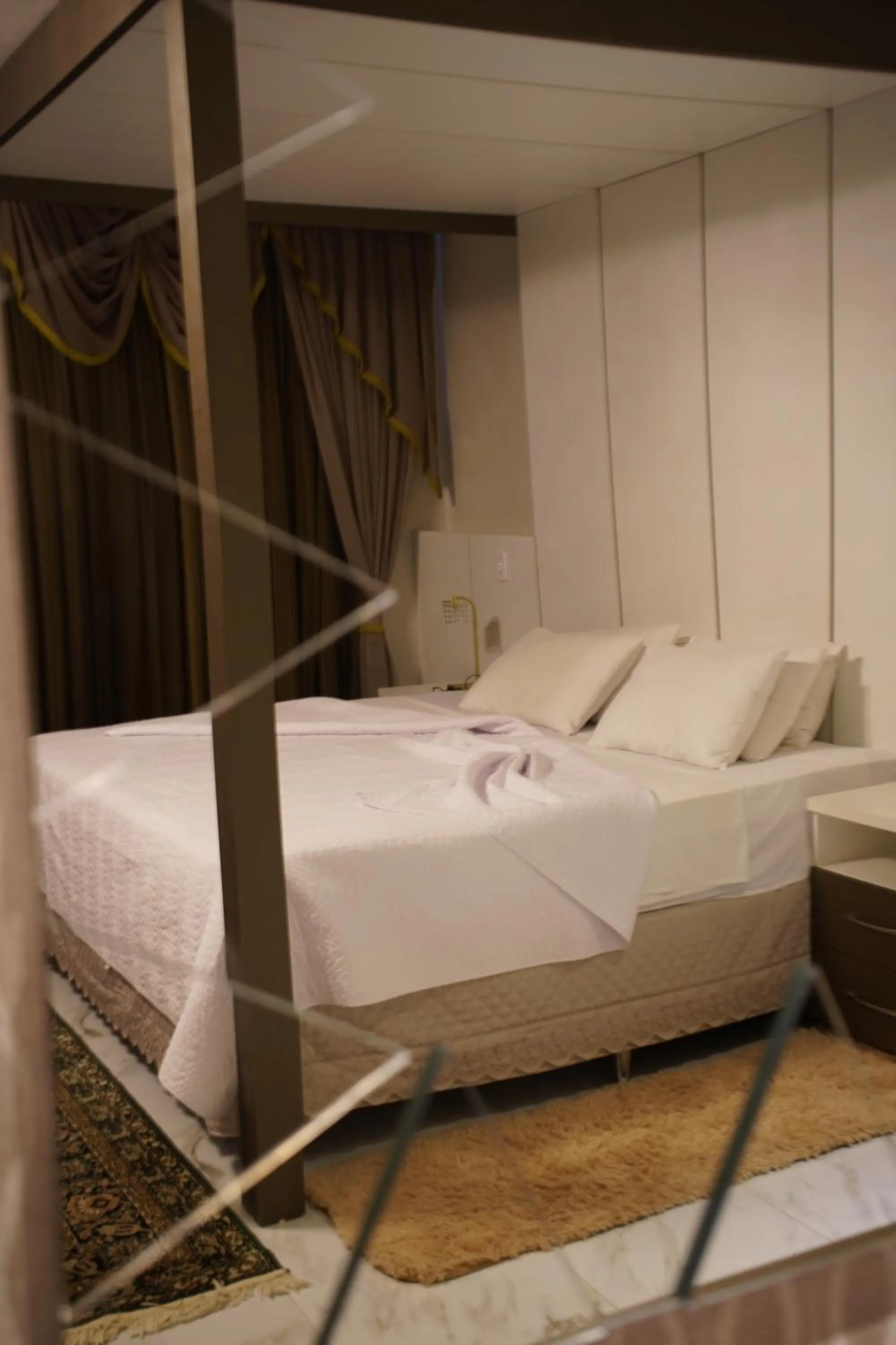 Bed in Pak Suítes Hotel